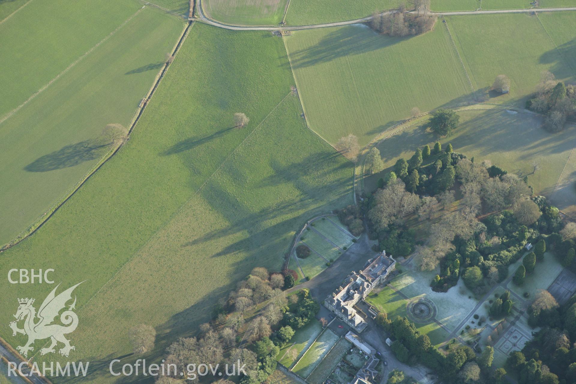 RCAHMW colour oblique photograph of Trawsgoed, showing earthworks of former garden terraces to the east of Trawsgoed Mansion. Taken by Toby Driver on 20/12/2007.