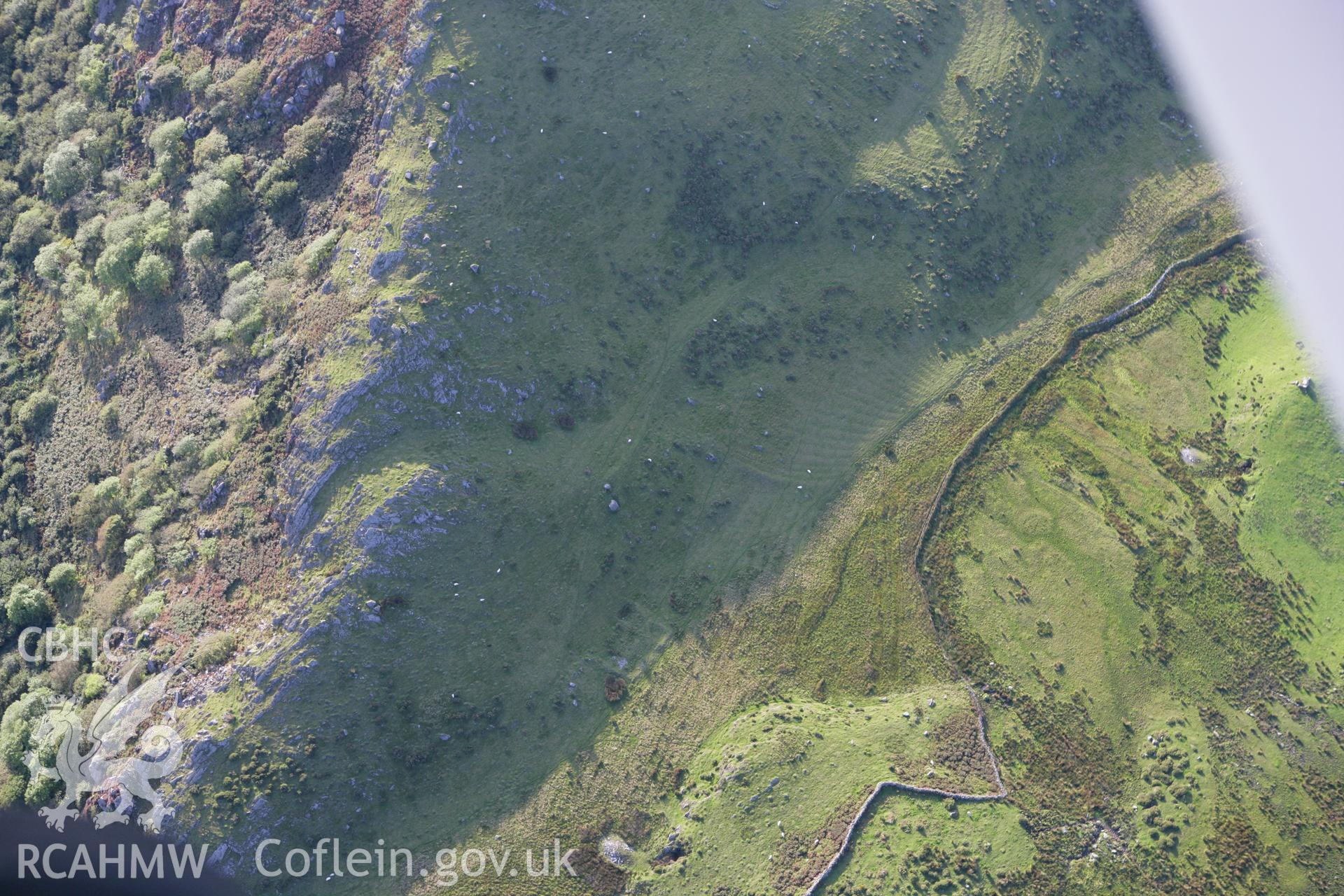 RCAHMW colour oblique aerial photograph of Round Huts at Craig-y-Gesail. Taken on 06 September 2007 by Toby Driver