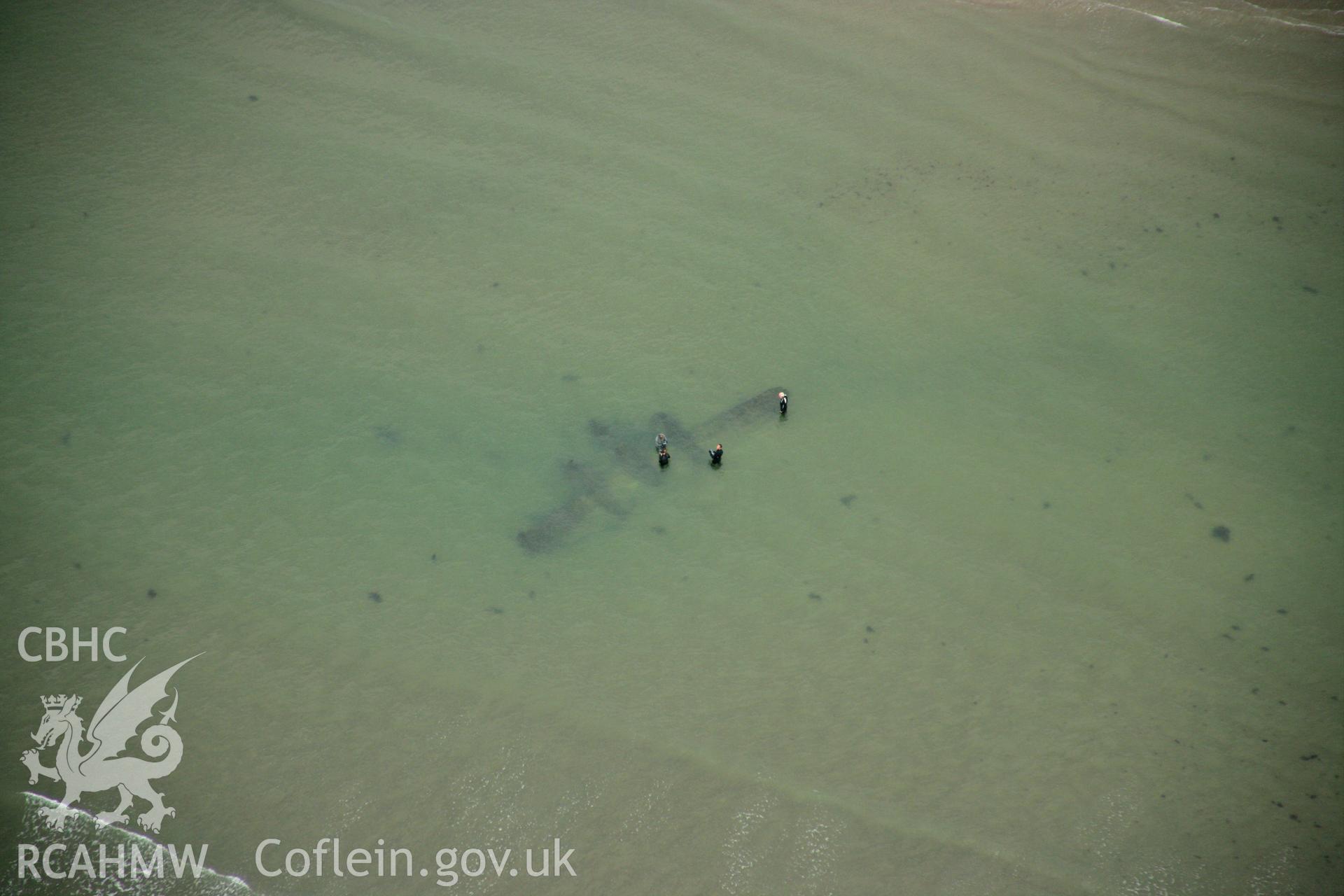 RCAHMW colour oblique photograph of P-38 Lightning, aircraft wreck at low tide. Taken by Toby Driver on 08/10/2007.