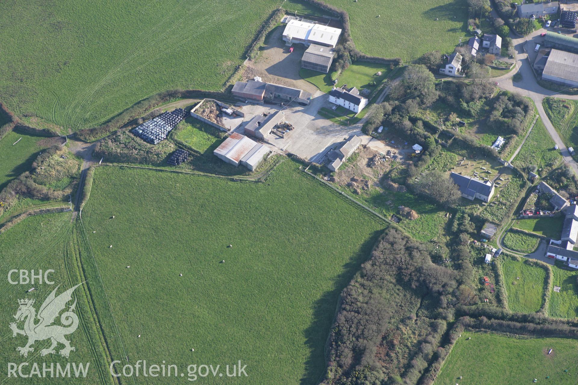 RCAHMW colour oblique photograph of St Gwyndaf's church, Llanwnda;Views of Llanwnda from South. Taken by Toby Driver on 23/10/2007.