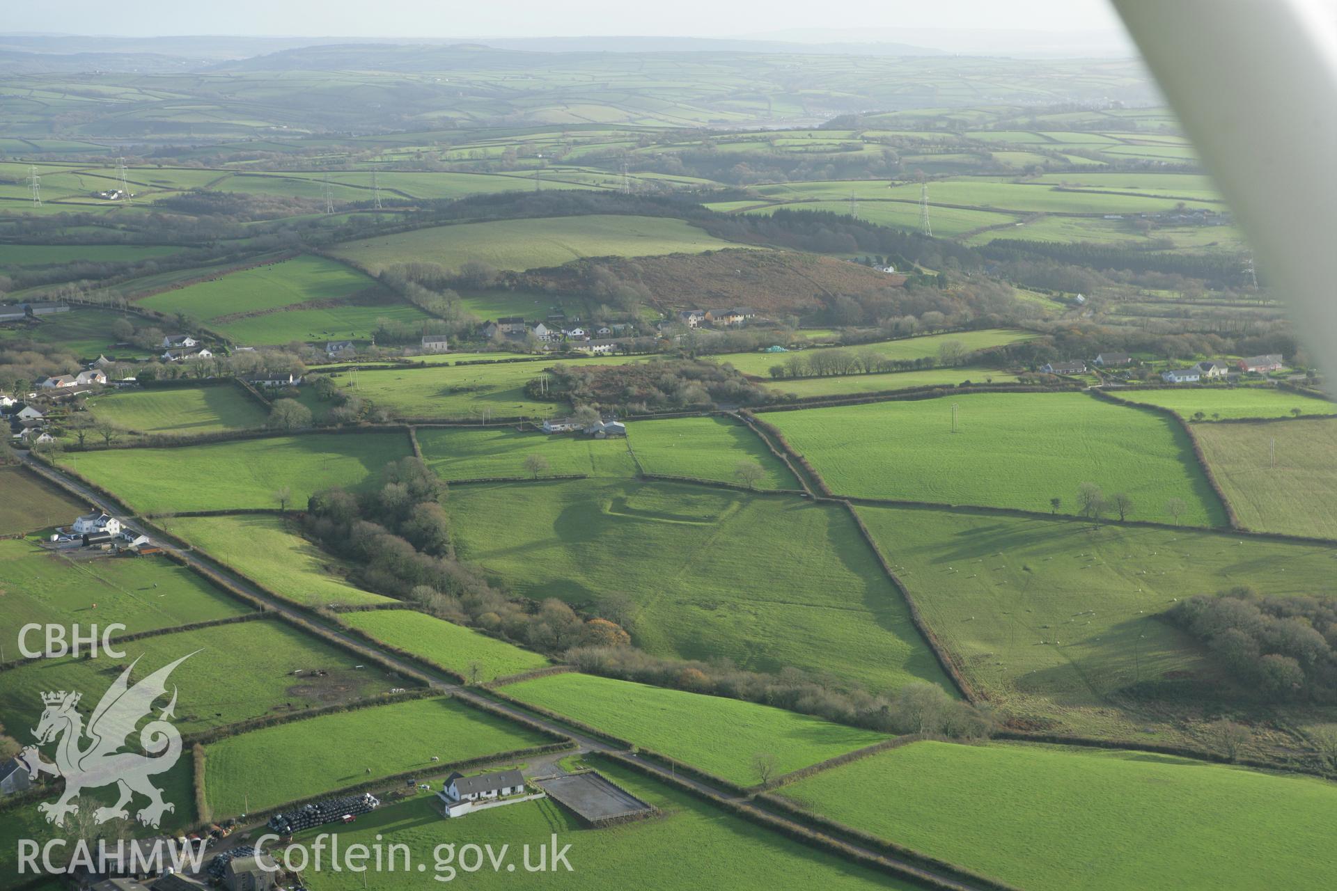 RCAHMW colour oblique photograph of Bryn Cywyn enclosure. Taken by Toby Driver on 29/11/2007.