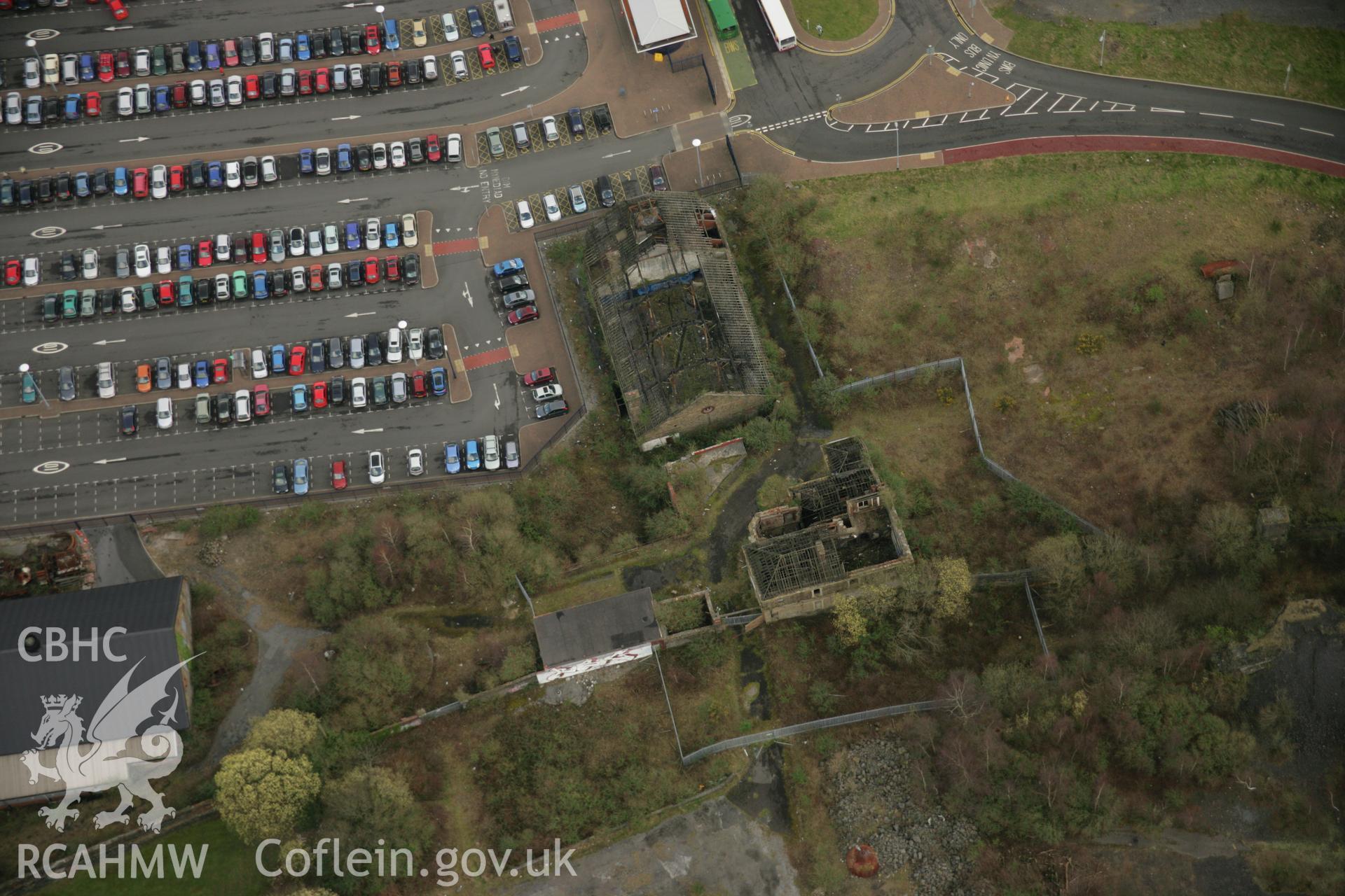 RCAHMW colour oblique aerial photograph of Morfa Copperworks Power House and Canteen, Swansea. Taken on 16 March 2007 by Toby Driver