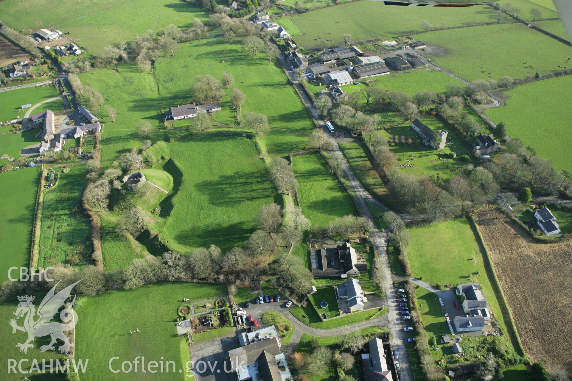 RCAHMW colour oblique photograph of Wiston Castle, and village. Taken by Toby Driver on 29/11/2007.