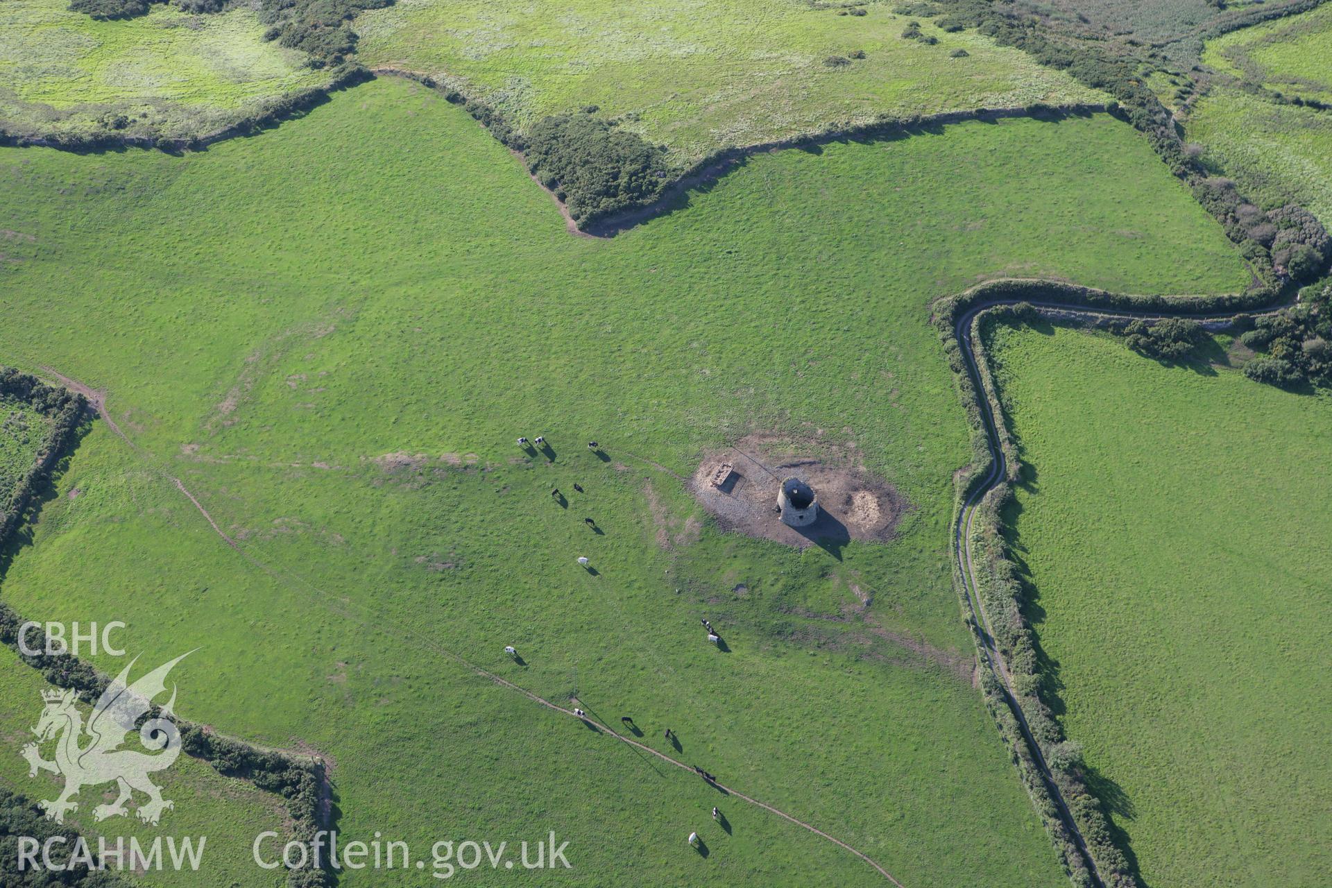 RCAHMW colour oblique aerial photograph of Llanengan Windmill and field system. Taken on 06 September 2007 by Toby Driver