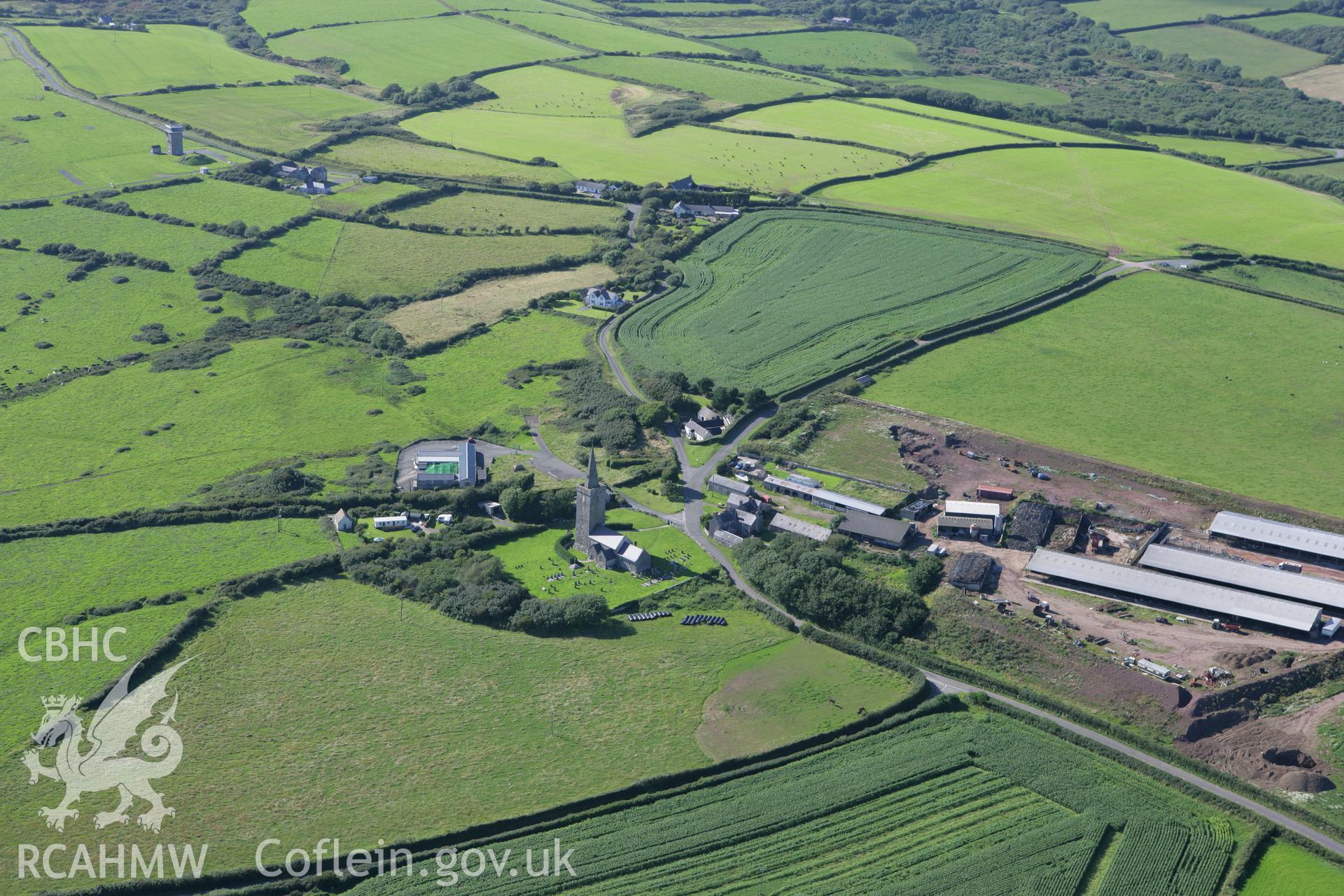 RCAHMW colour oblique aerial photograph of St Mary's Church, Warren. Taken on 30 July 2007 by Toby Driver