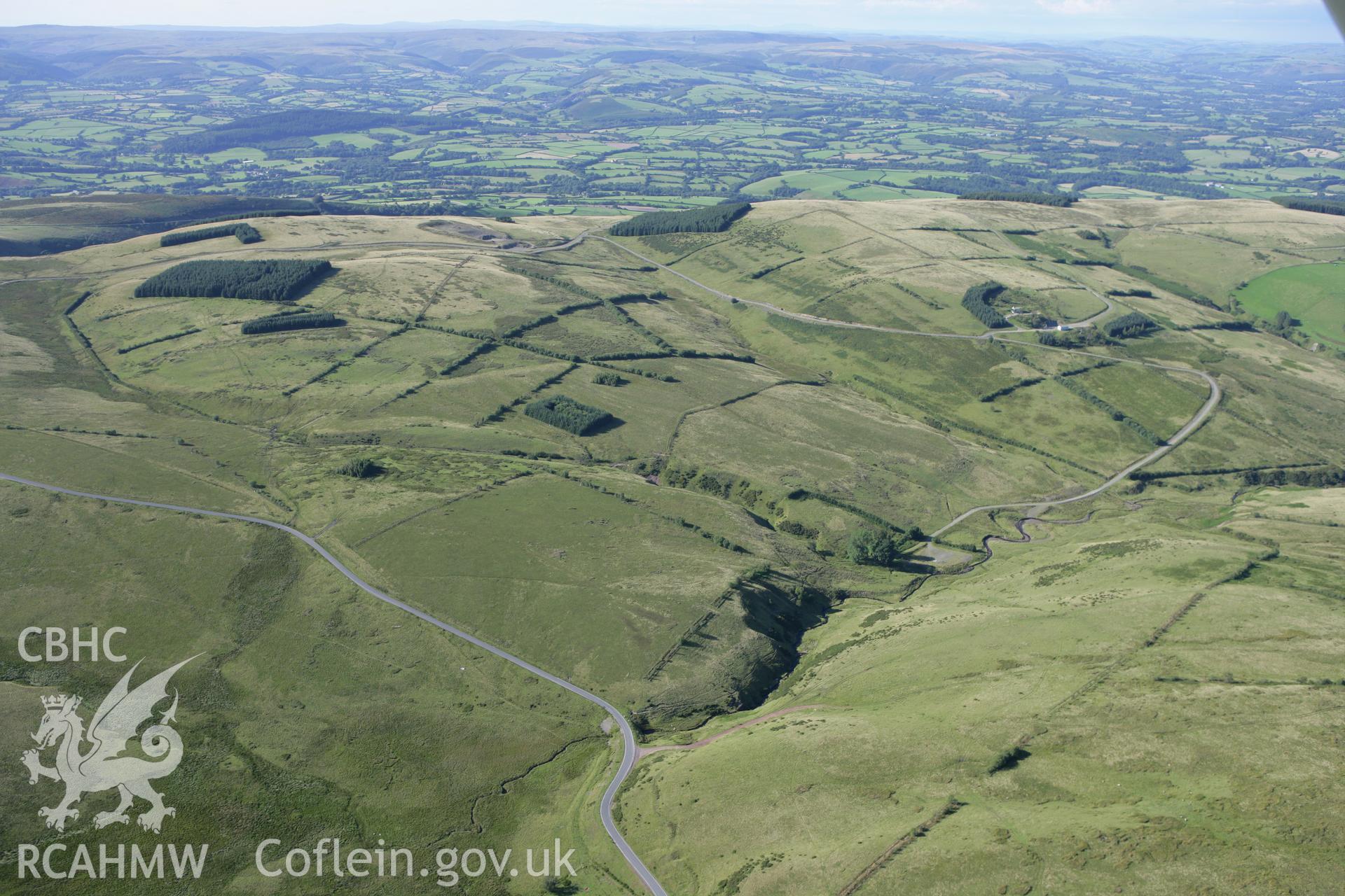 RCAHMW colour oblique aerial photograph of Blaen Duhonw Deserted Rural Settlement, Llangammarch Wells, and the surrounding landscape. Taken on 08 August 2007 by Toby Driver