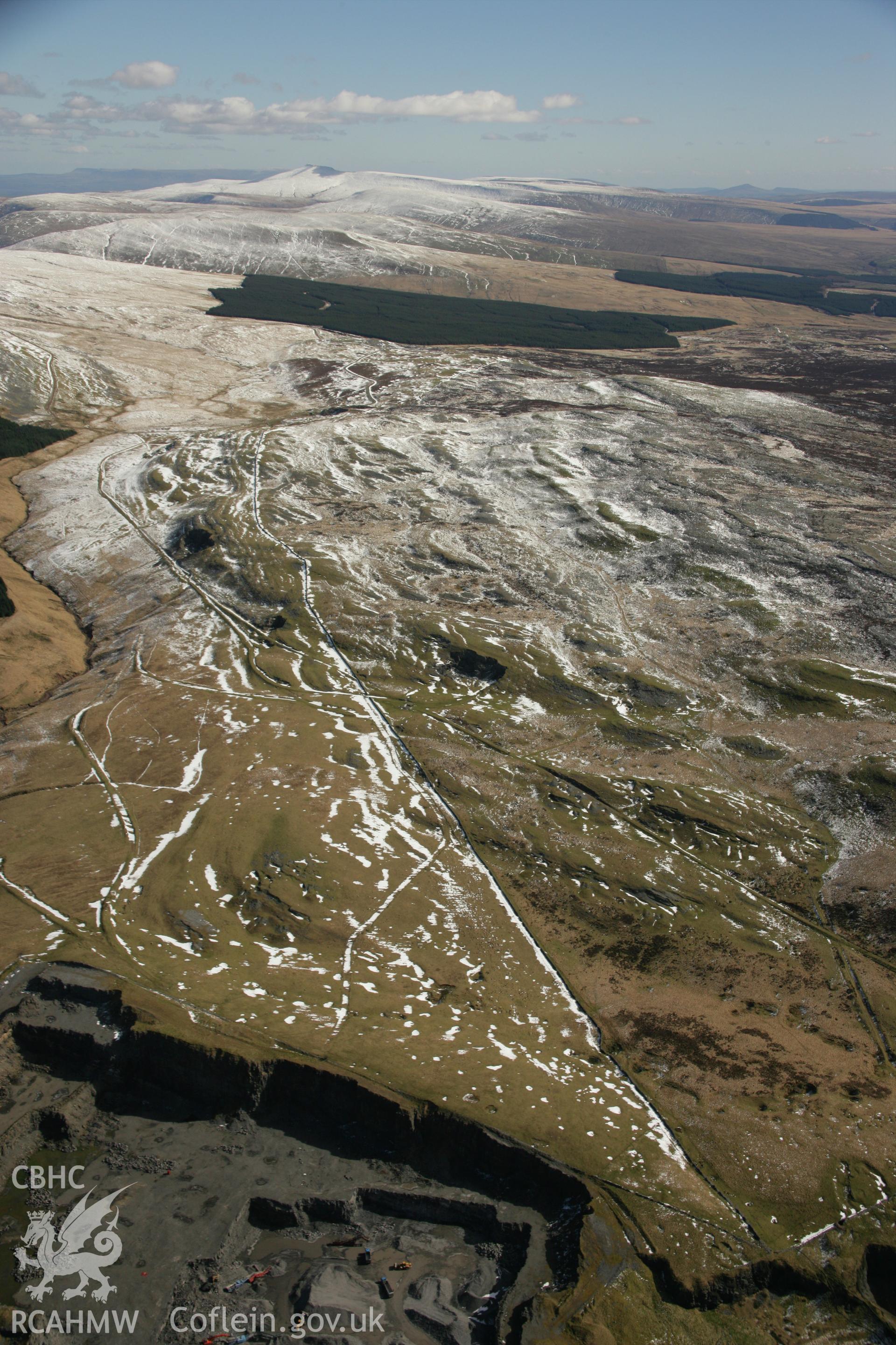 RCAHMW colour oblique aerial photograph of Penwyllt Limestone Quarry 2 and tramroads. Taken on 21 March 2007 by Toby Driver