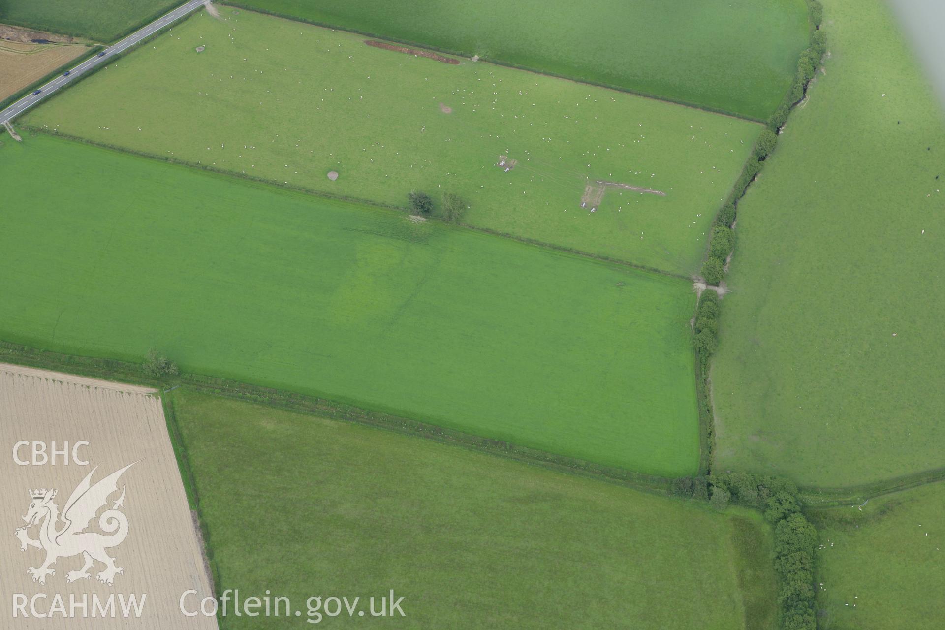 RCAHMW colour oblique aerial photograph of Walton Roman Camp III. Taken on 09 July 2007 by Toby Driver