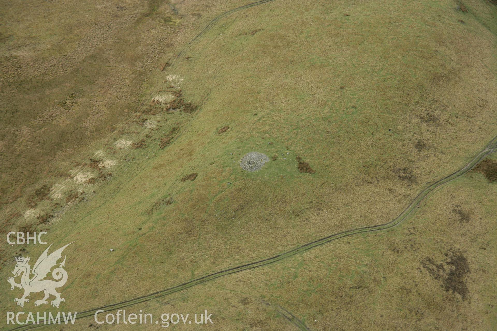 RCAHMW colour oblique aerial photograph of Garn Wen Cairn, Trefenter, from the north. Taken on 17 April 2007 by Toby Driver