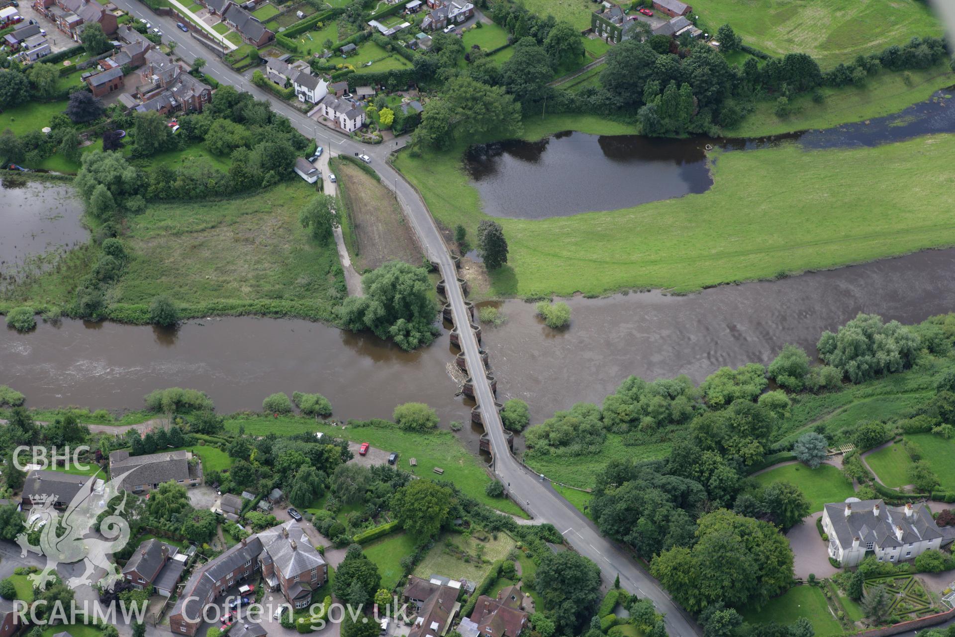 RCAHMW colour oblique aerial photograph of Holt Bridge, Holt, Wrexham. Taken on 24 July 2007 by Toby Driver