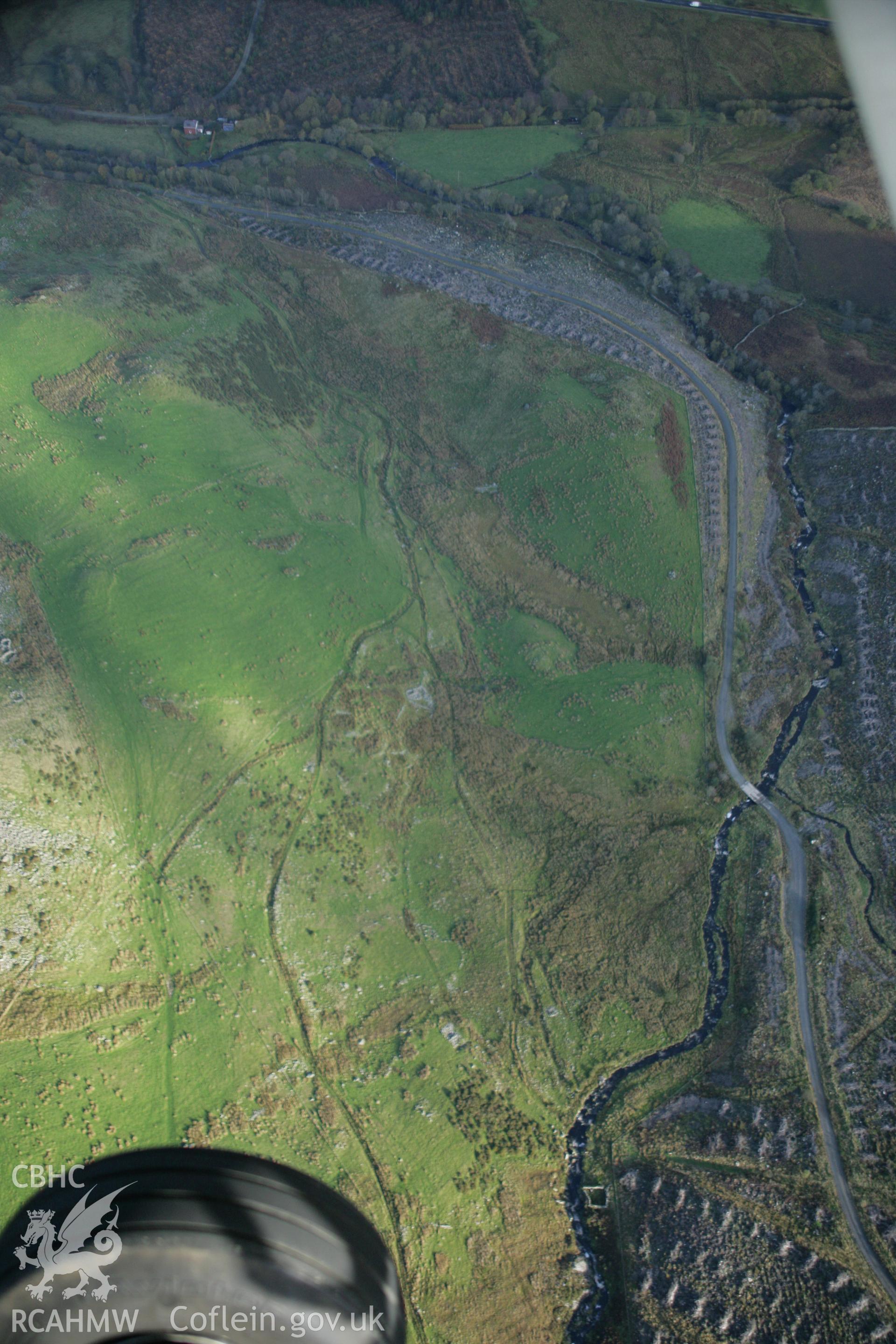 RCAHMW colour oblique photograph of Moel Caws hut group. Taken by Toby Driver on 30/10/2007.