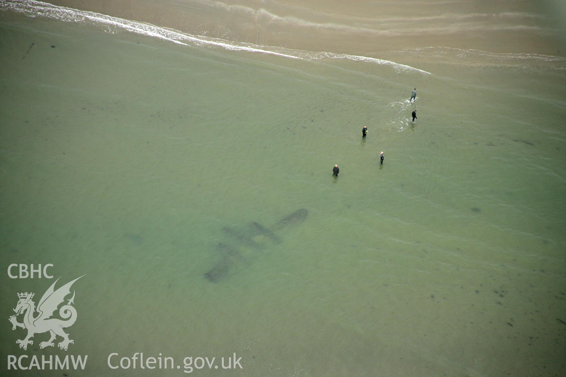 RCAHMW colour oblique photograph of P-38 Lightning, aircraft wreck at low tide. Taken by Toby Driver on 08/10/2007.