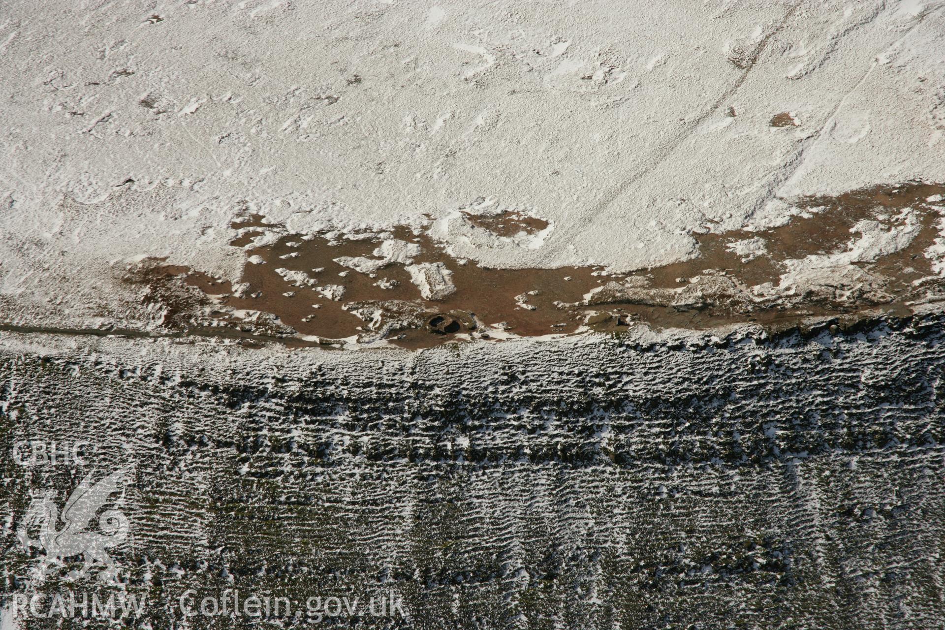 RCAHMW colour oblique aerial photograph of Twr-y-Fan Foel Cairn. Taken on 21 March 2007 by Toby Driver