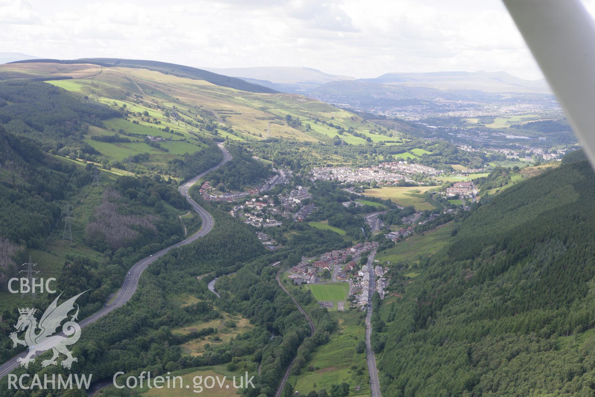 RCAHMW colour oblique aerial photograph of Pont-y-Gwaith Road Bridge over the Merthyr Tramroad, from the south. Taken on 30 July 2007 by Toby Driver