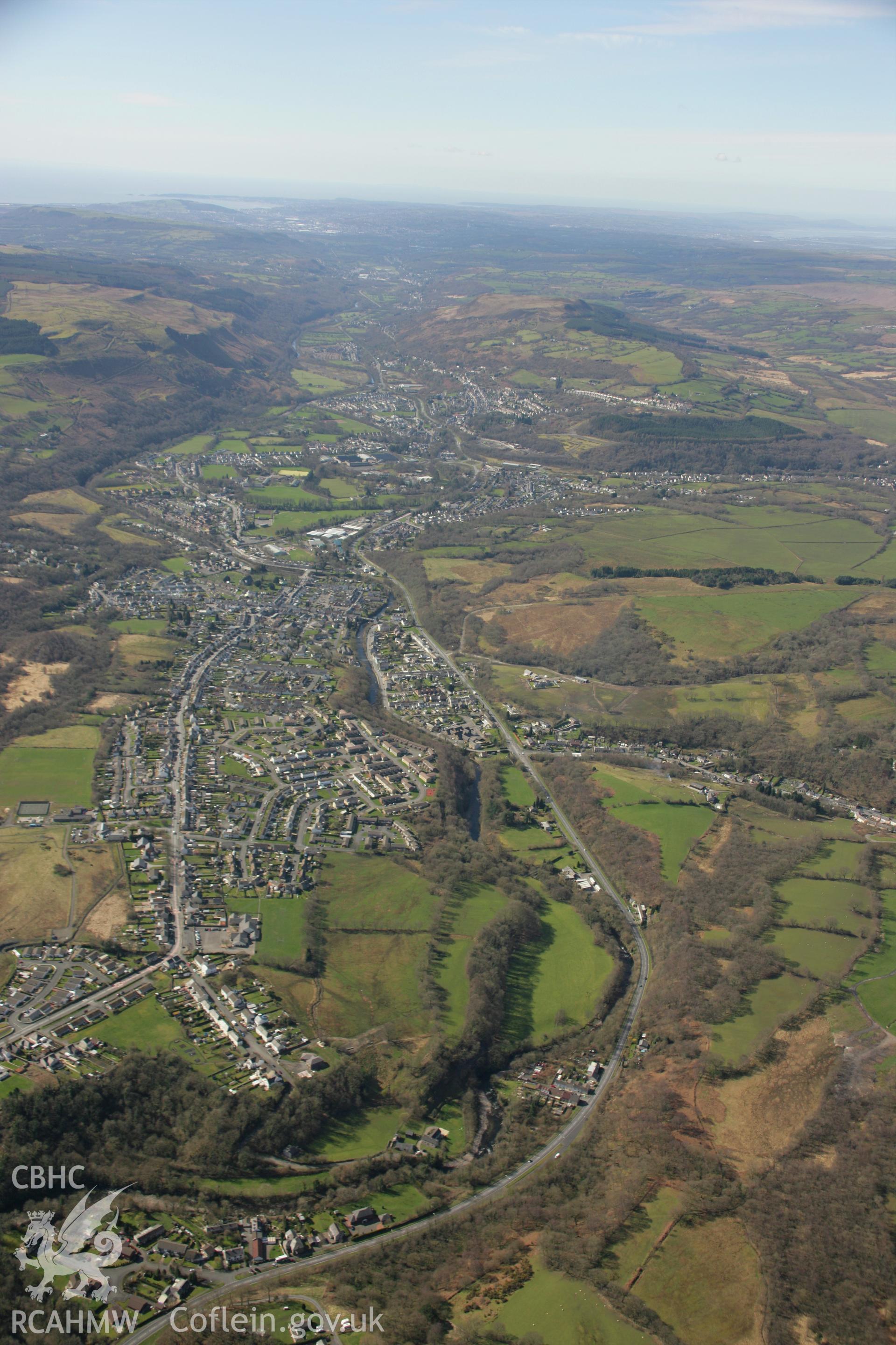 RCAHMW colour oblique aerial photograph of Ystradgynlais in landscape view from the north - east. Taken on 21 March 2007 by Toby Driver