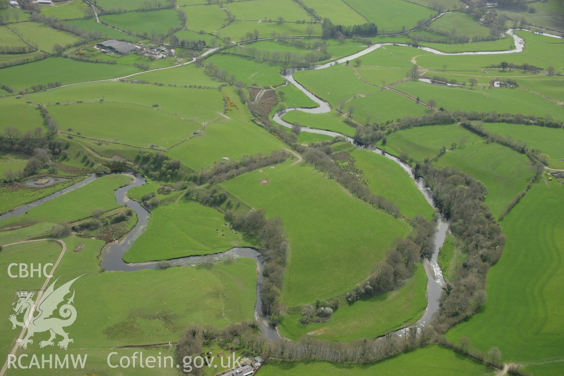 RCAHMW colour oblique aerial photograph of Pont Llanio Railway Station and disused track. Taken on 17 April 2007 by Toby Driver