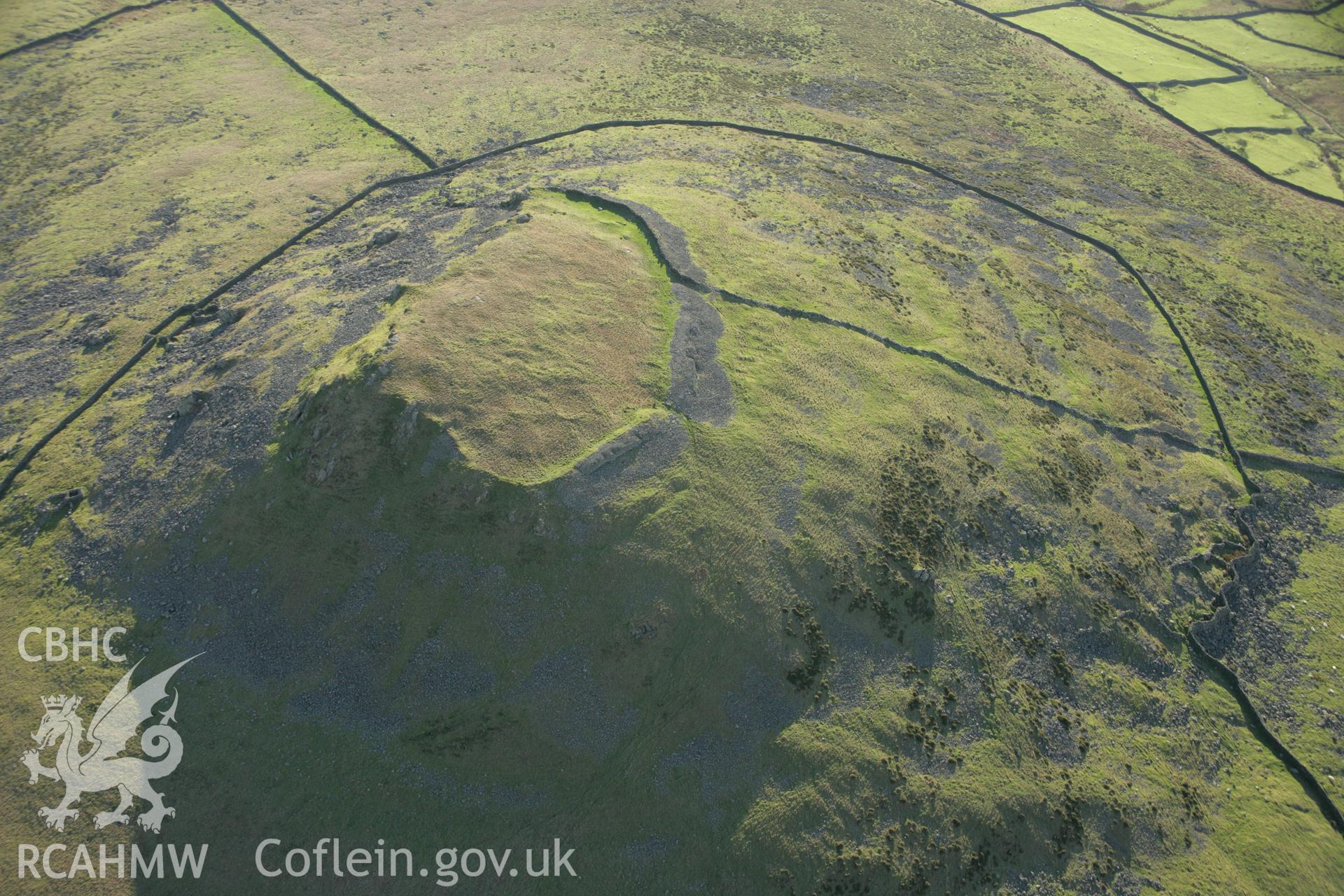 RCAHMW colour oblique aerial photograph of Pen-y-Gaer, with view of Camp. Taken on 25 January 2007 by Toby Driver