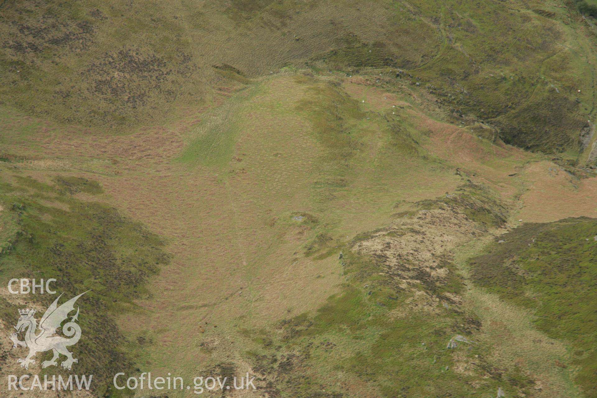 RCAHMW colour oblique aerial photograph of Lluest Pencraig Ddu Deserted Rural Settlement. Taken on 17 April 2007 by Toby Driver