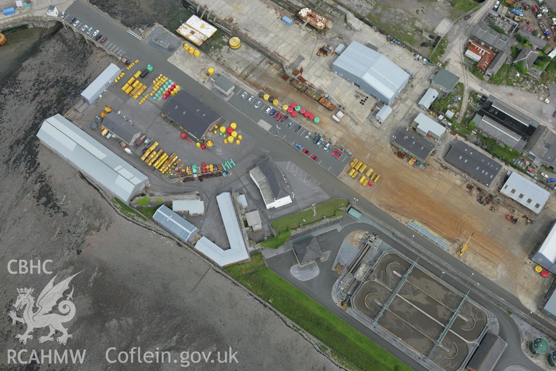 RCAHMW colour oblique photograph of Pembroke Dockyard, workshop. Taken by Toby Driver on 01/08/2007.