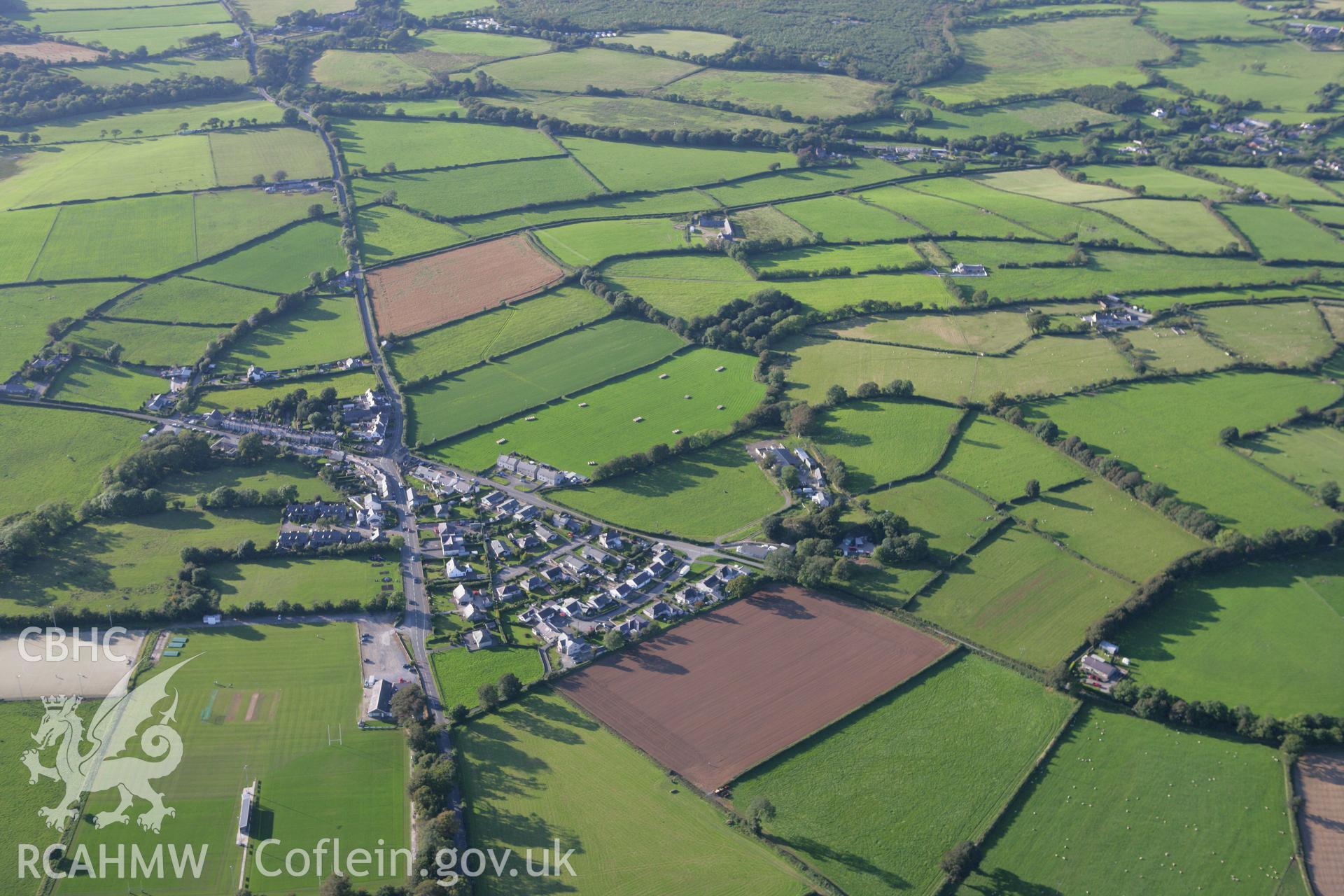 RCAHMW colour oblique aerial photograph of King George's Field Enclosure at Efailnewydd. Taken on 06 September 2007 by Toby Driver