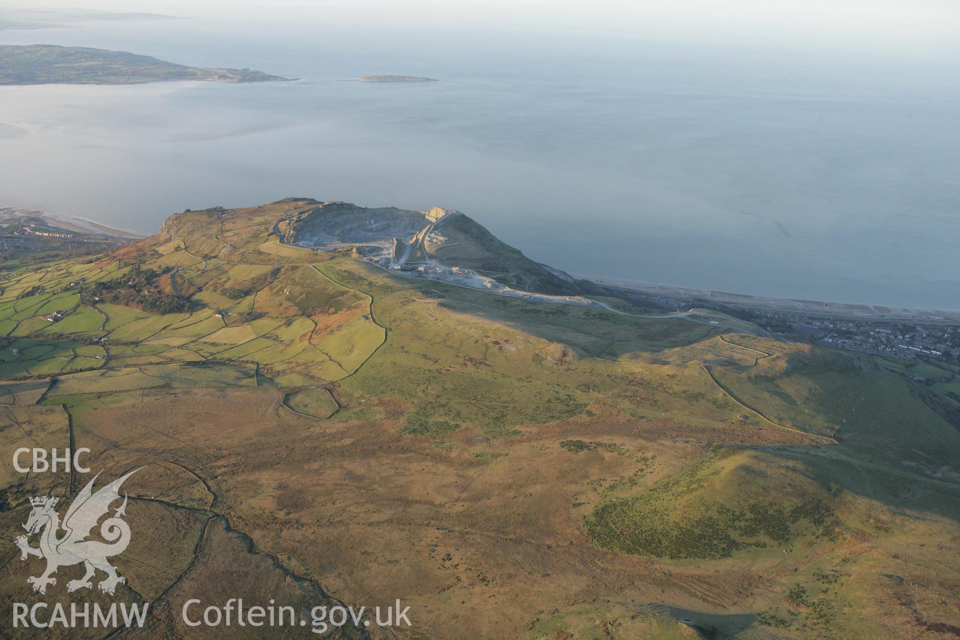 RCAHMW colour oblique photograph of Penmaenmawr, showing a winter landscape over Braich y Dinas. Taken by Toby Driver on 20/12/2007.