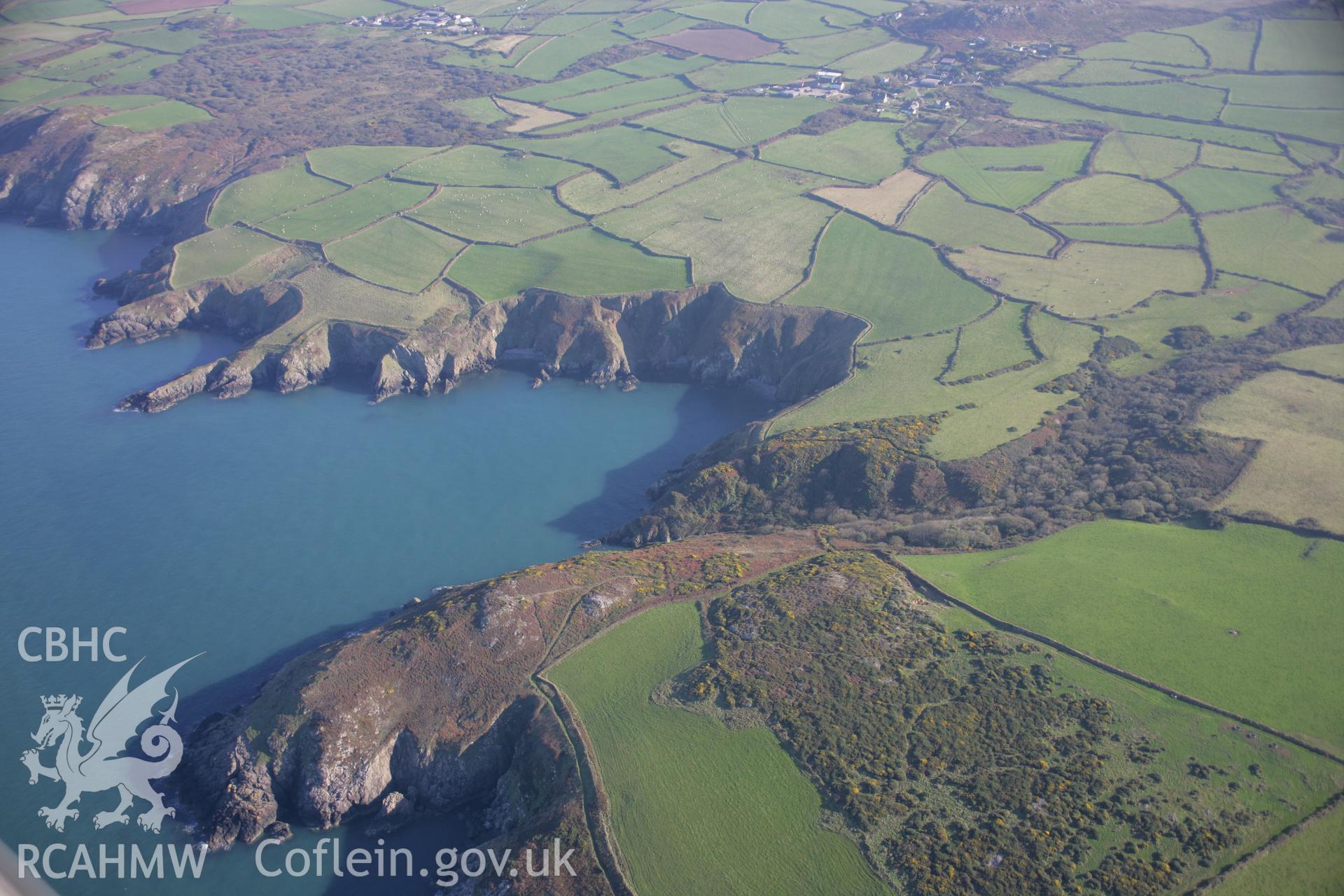 RCAHMW colour oblique photograph of Carregwastad point;Carreg Wastad, near Llandwnda. Taken by Toby Driver on 23/10/2007.