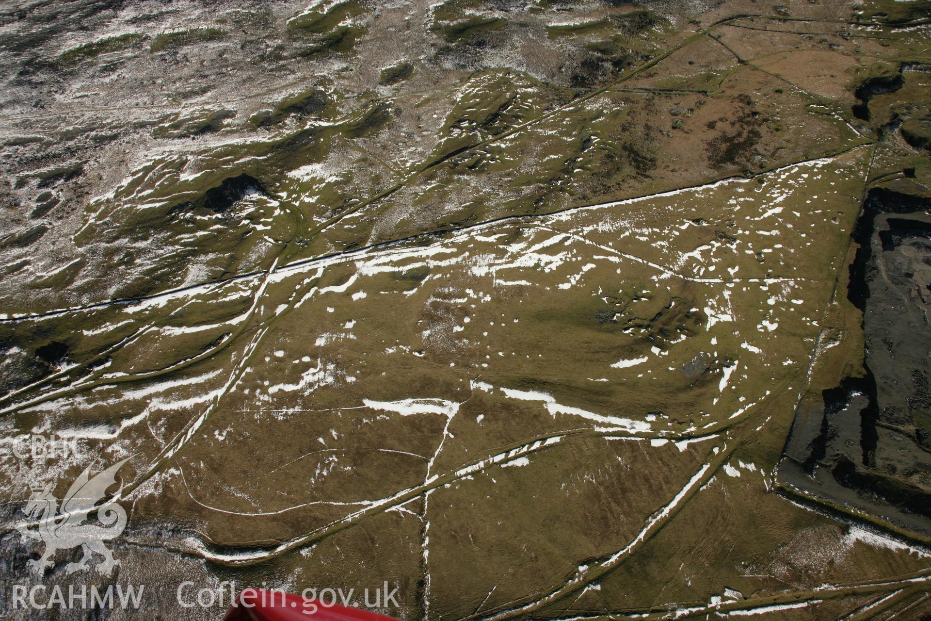 RCAHMW colour oblique aerial photograph of Penwyllt Limestone Quarry 2 and tramroads. Taken on 21 March 2007 by Toby Driver