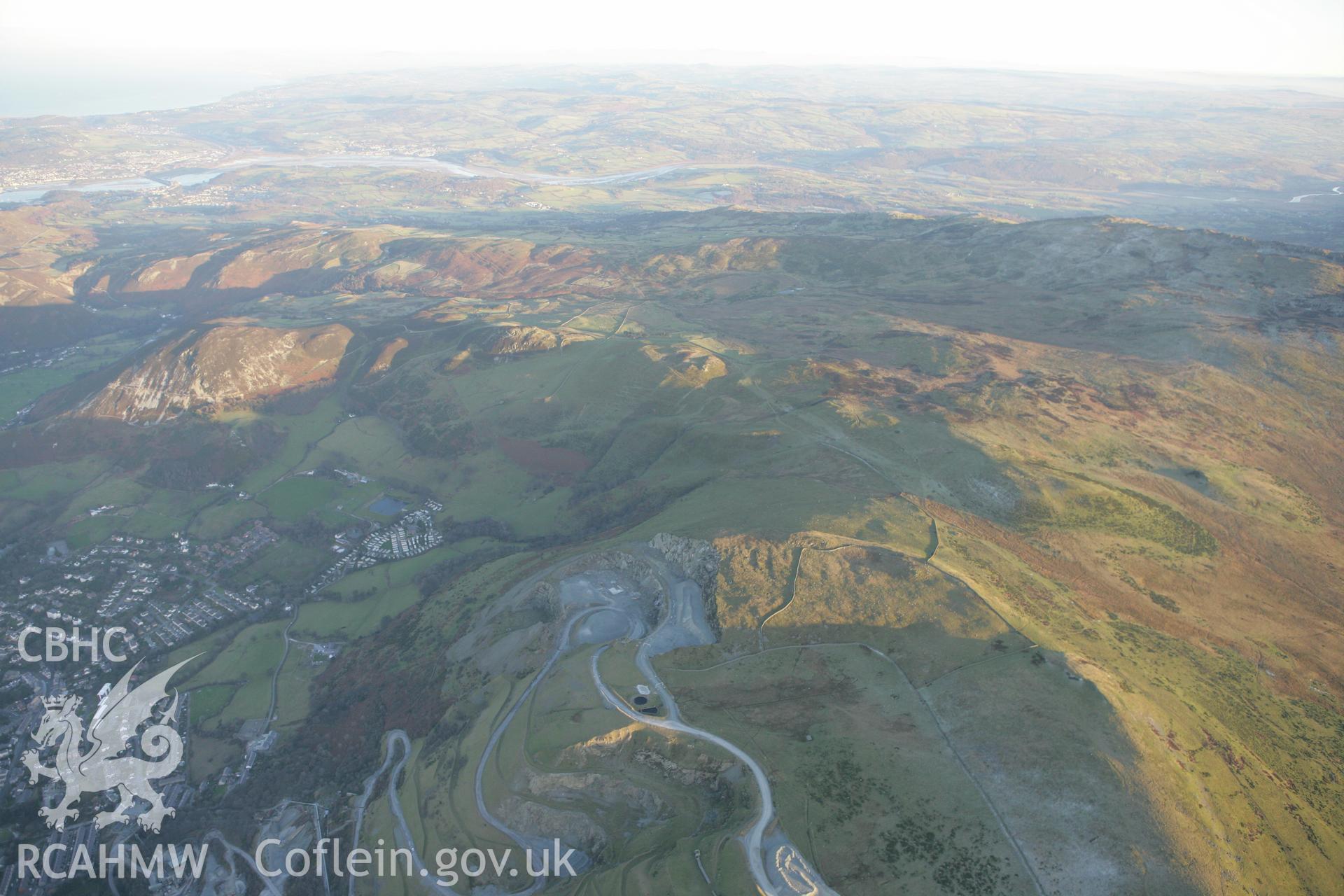 RCAHMW colour oblique photograph of Clip yr Orsedd hut circles. Taken by Toby Driver on 20/12/2007.