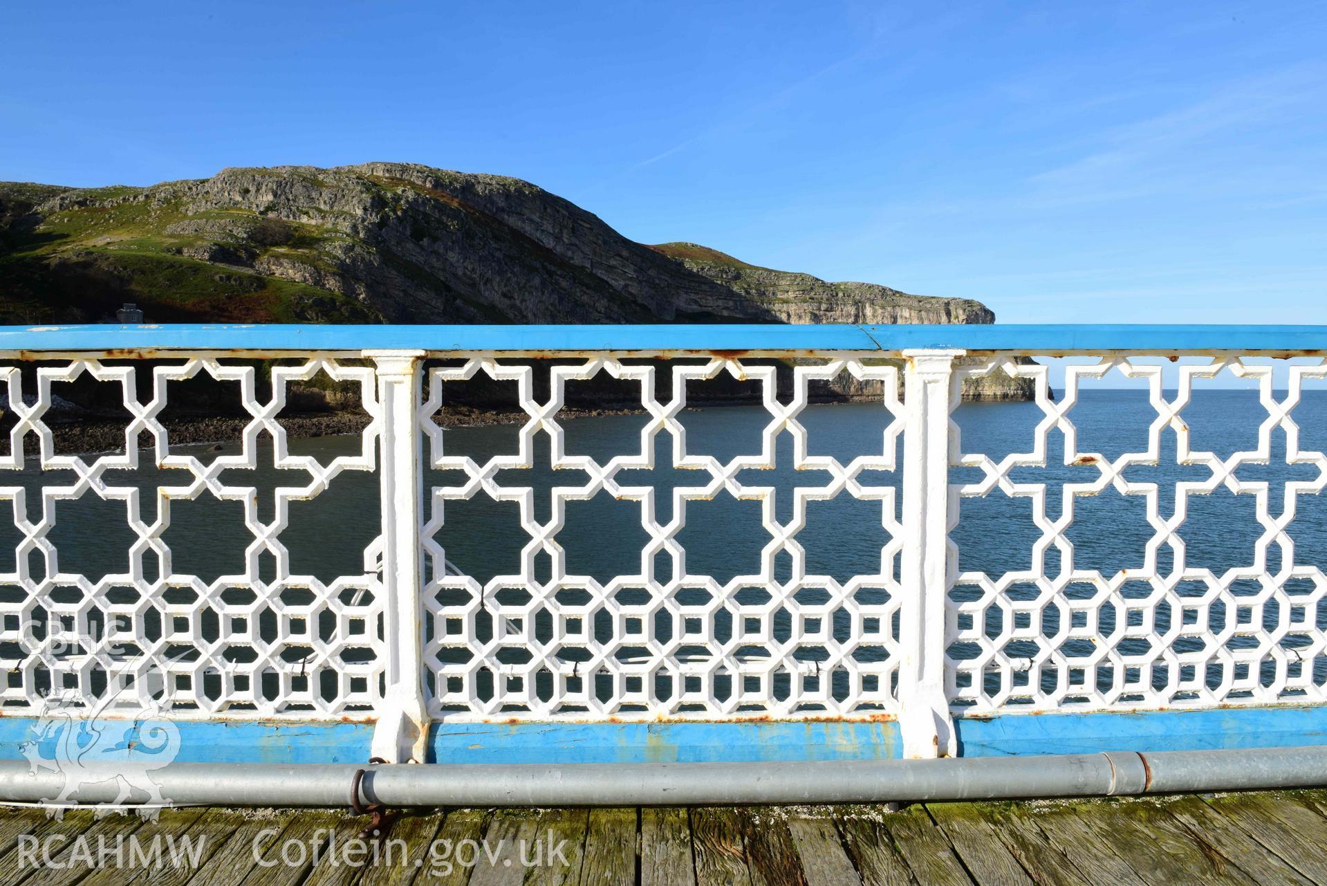 Llandudno Pier: view looking north-west through Charles Driver's Islamic-inspired cast iron railing panels, towards the Orme