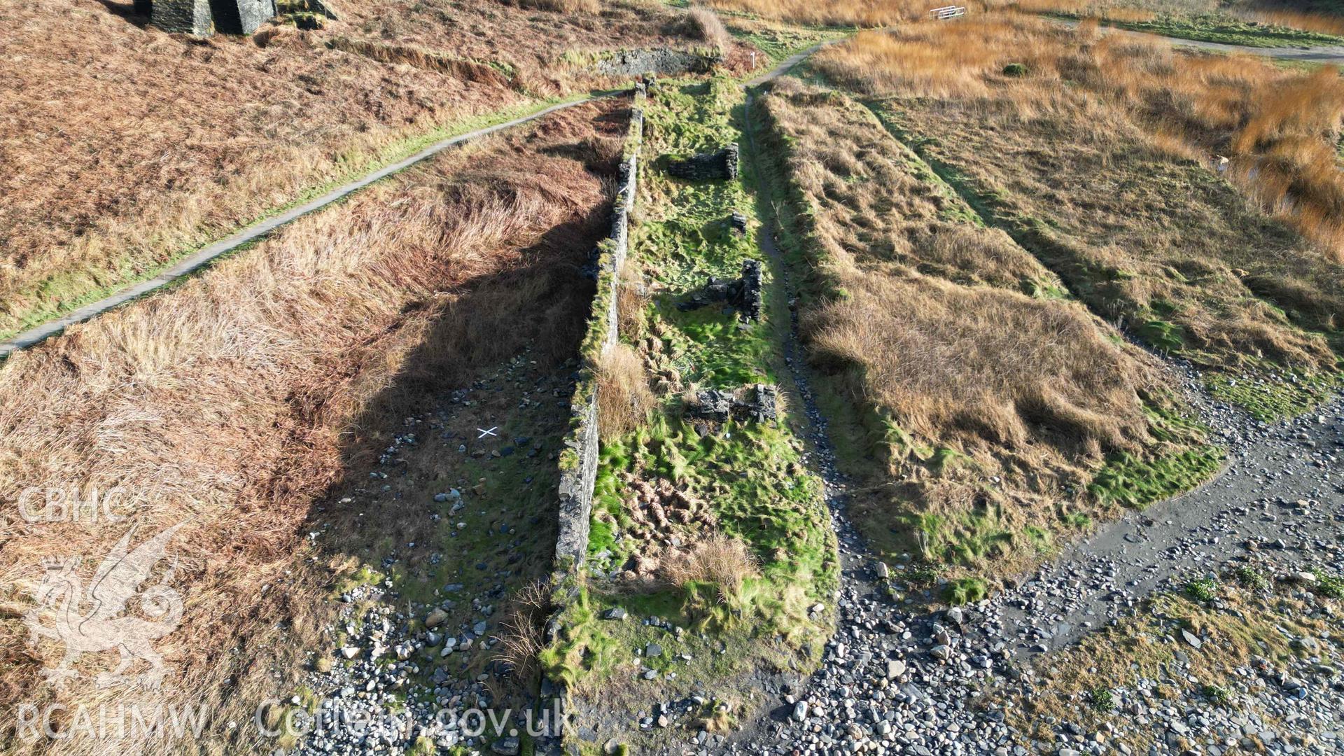 Oblique view, looking east, of the row of quarryworker's cottages at Abereiddi/Abereiddy on 11/12/2024.