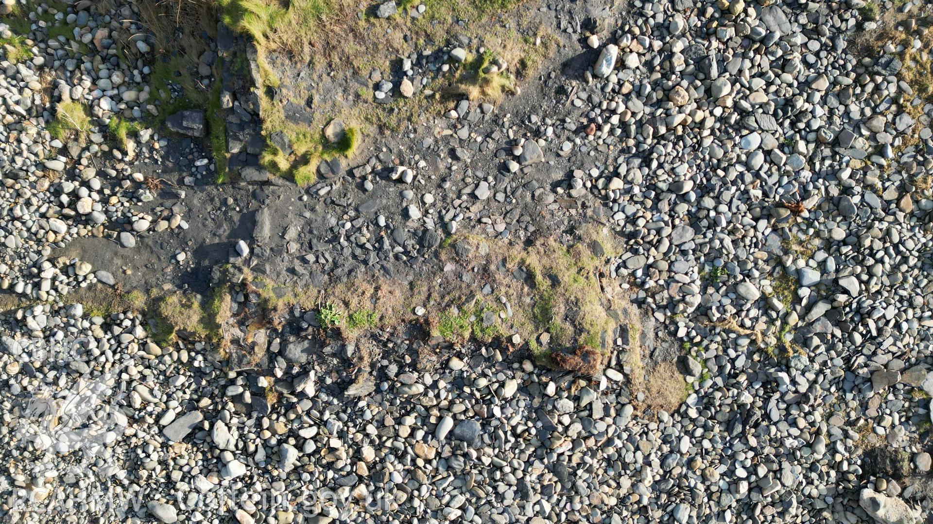 Overhad view of Cottage 1 at Abereiddi/Abereiddy on 11/12/2024, showing ongoing erosion to the seaward end of the cottage. North is to the left.