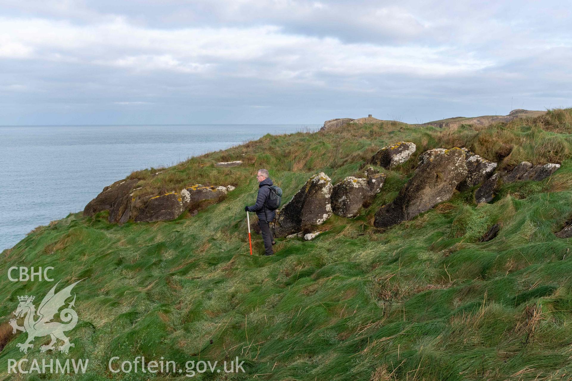 Little Aber Pwll coastal promontort fort. Rock outcrops defining the interior of the fort (with scale).