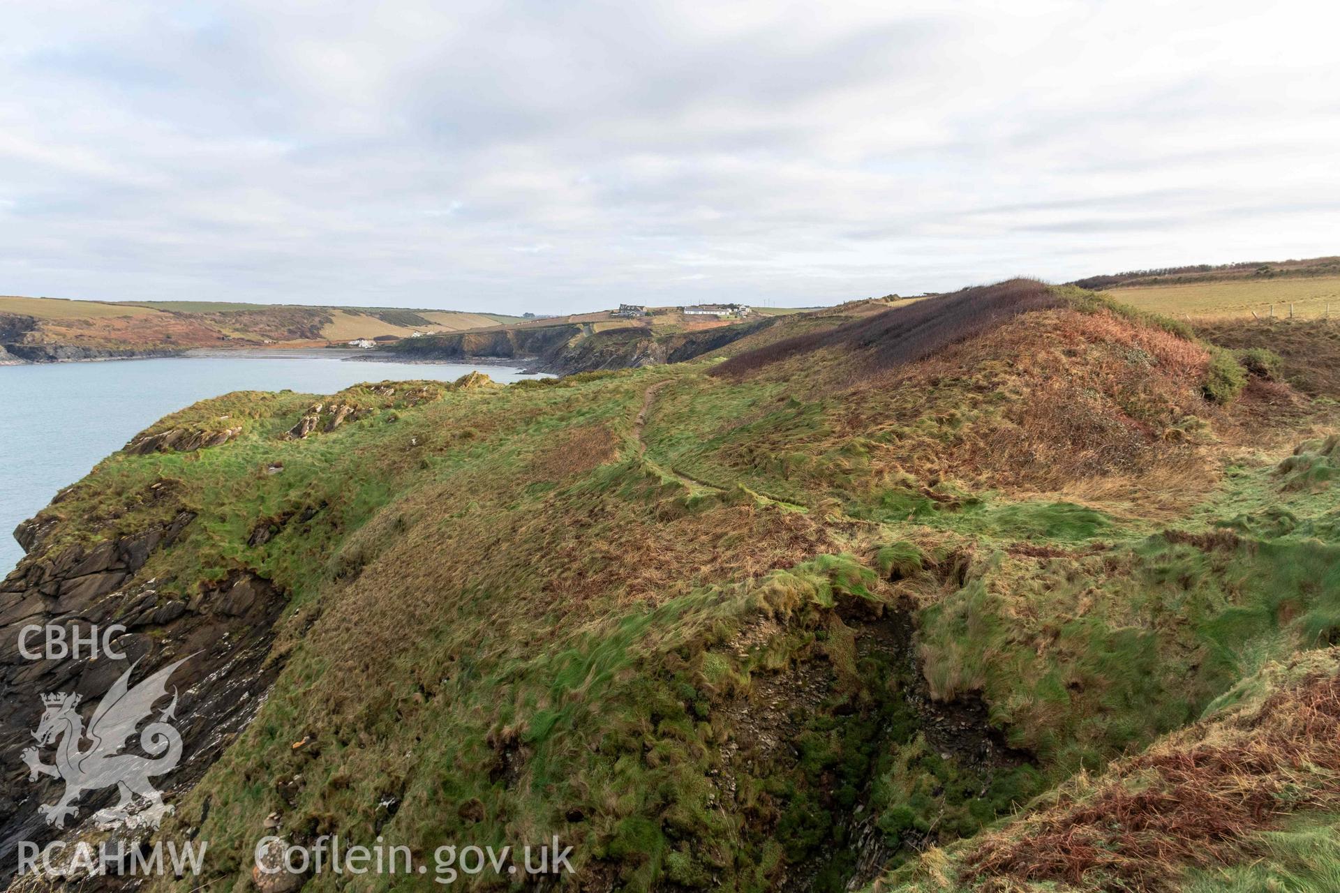 Little Aber Pwll coastal promontort fort. Looking east across to promontory fort and the substantial defensive bank defining the fort's interior.