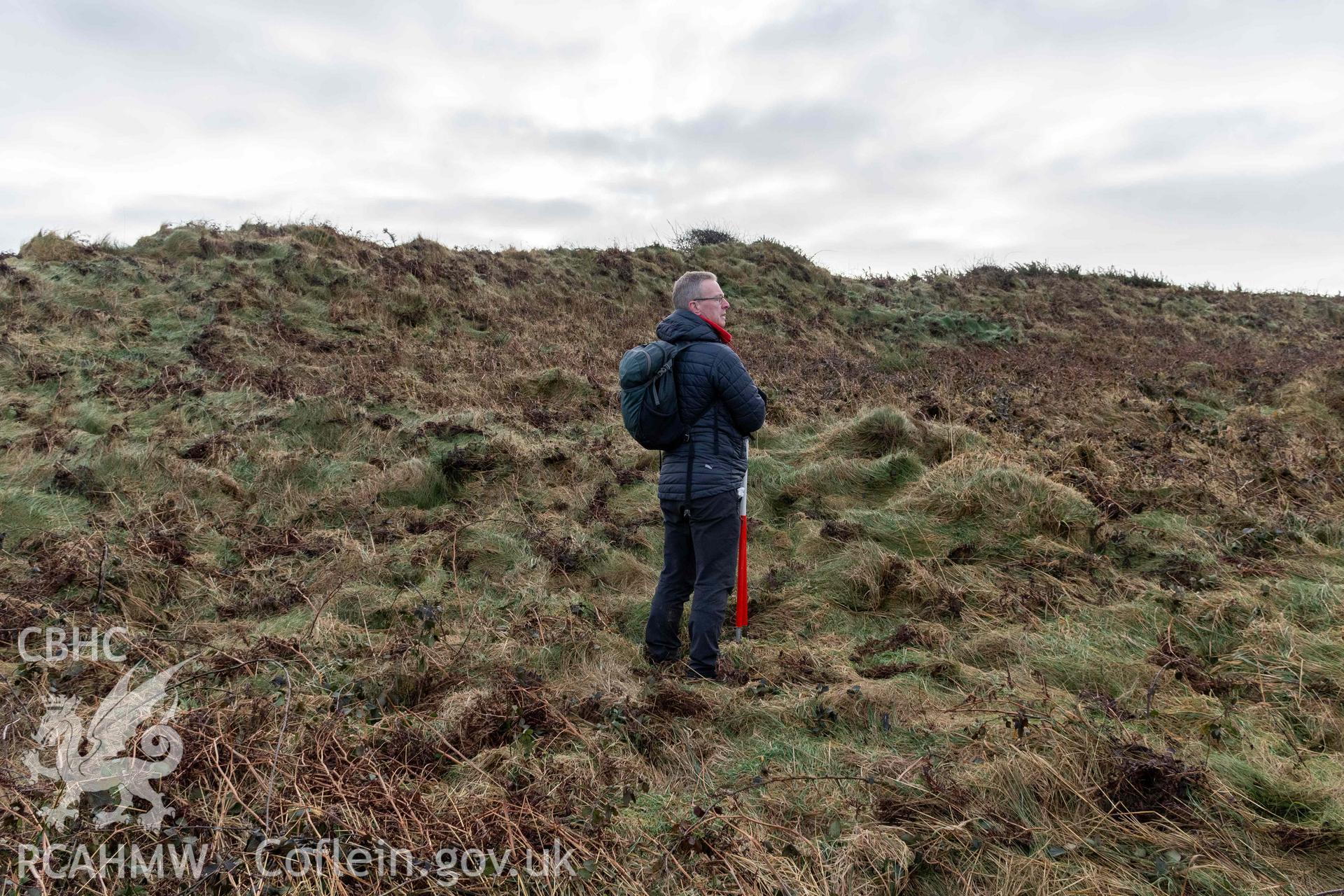 Caer Aber Pwll coastal promontory fort. Hut platform  in the eastern half of the fort's interior (with human scale).