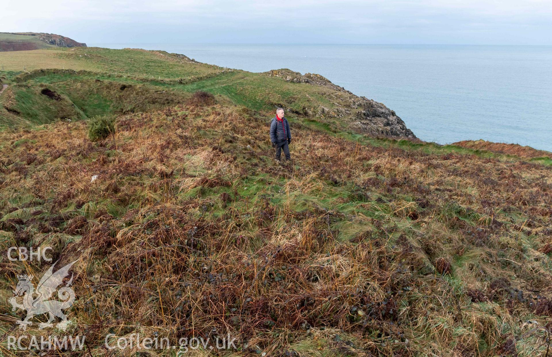 Caer Aber Pwll coastal promontory fort. Building /roundhouse? in the western half of the fort's interior, near to inner bank (with human scale).