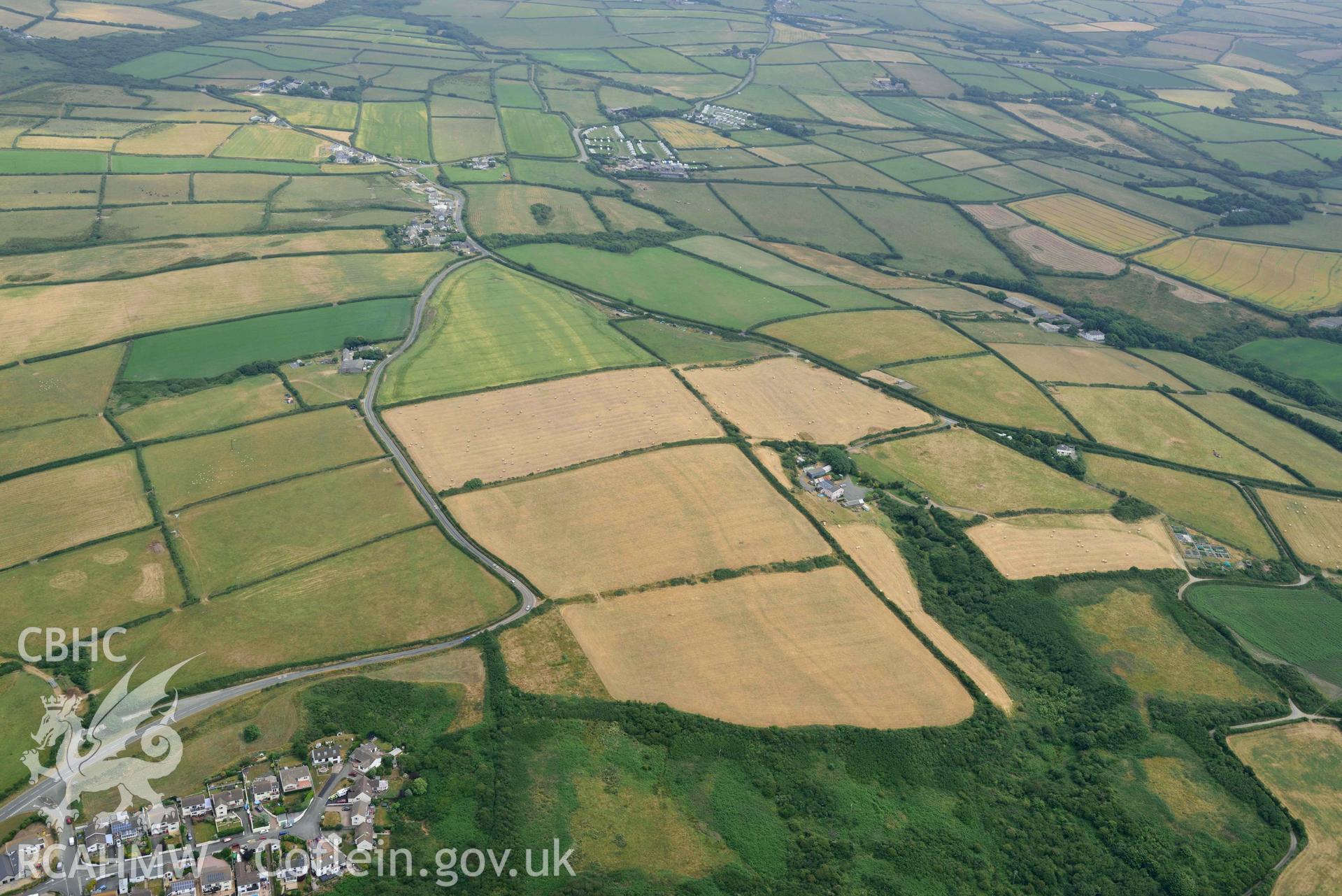 RCAHMW colour oblique aerial photograph of Linear geological cropmarks west of Broadway, at Bower Farm taken on 11 July 2018 by Toby Driver