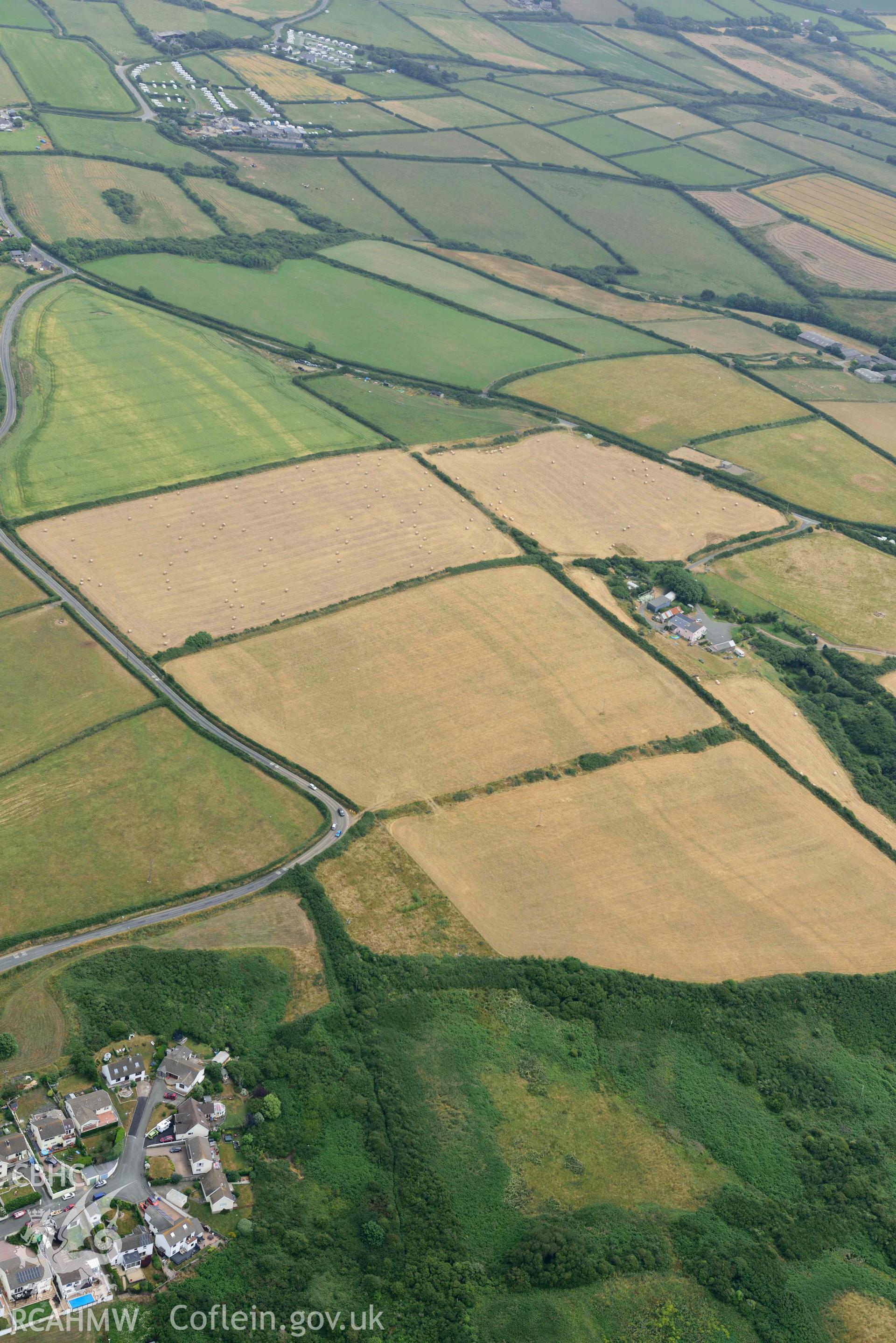 RCAHMW colour oblique aerial photograph of Linear geological cropmarks west of Broadway, at Bower Farm taken on 11 July 2018 by Toby Driver