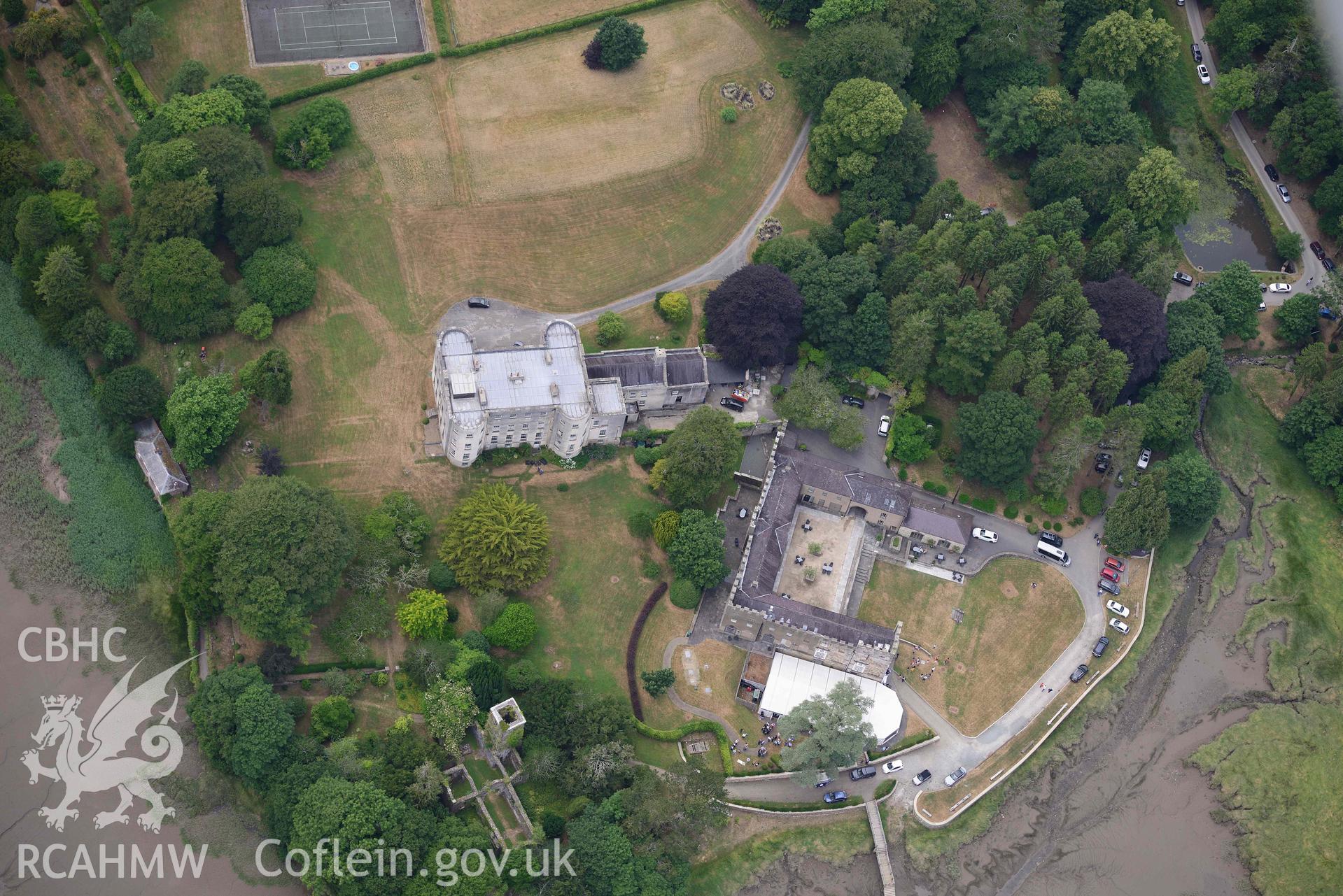 RCAHMW colour oblique aerial photograph of Slebech Park stables, Slebech Hall and St Johns Church taken on 11 July 2018 by Toby Driver