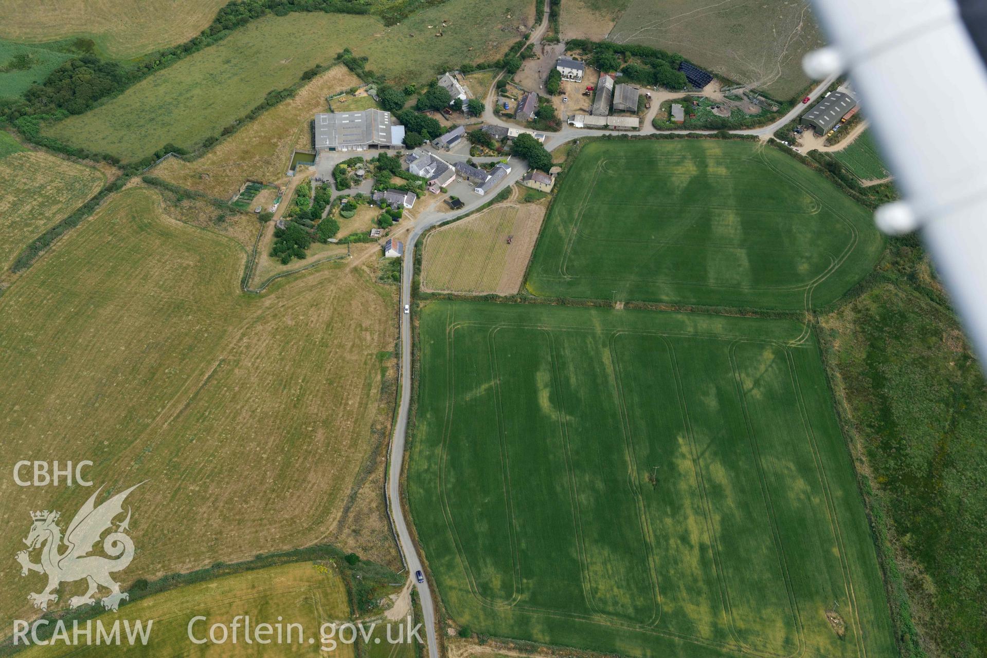 RCAHMW colour oblique aerial photograph of Portheiddy cropmarks taken on 11 July 2018 by Toby Driver