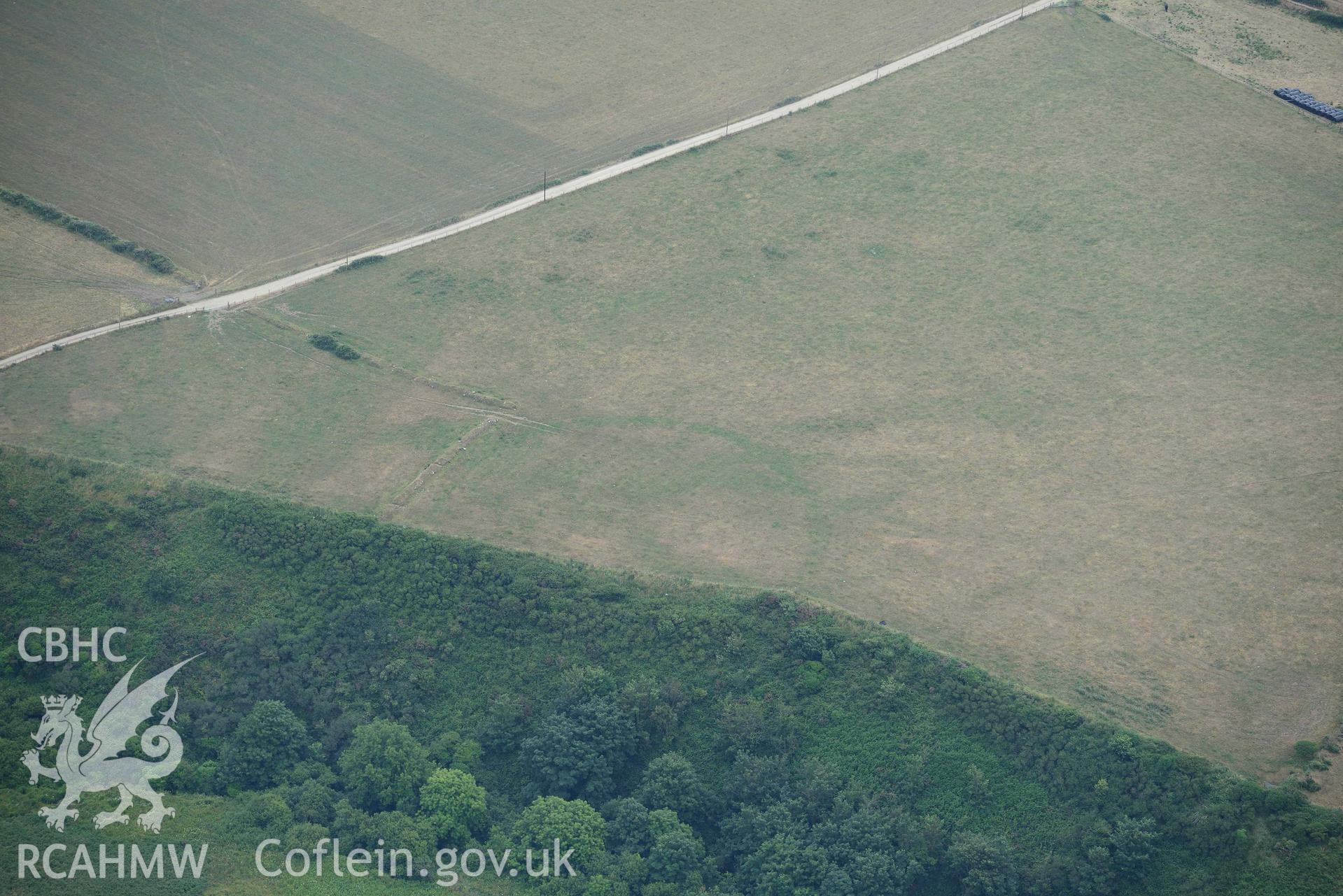 RCAHMW colour oblique aerial photograph of  St Elvis Promontory Fort taken on 11 July 2018 by Toby Driver