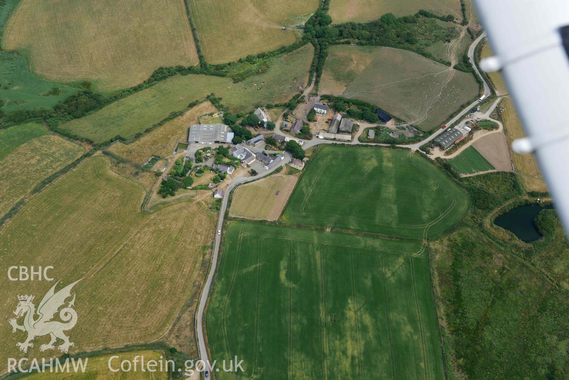 RCAHMW colour oblique aerial photograph of Portheiddy cropmarks taken on 11 July 2018 by Toby Driver