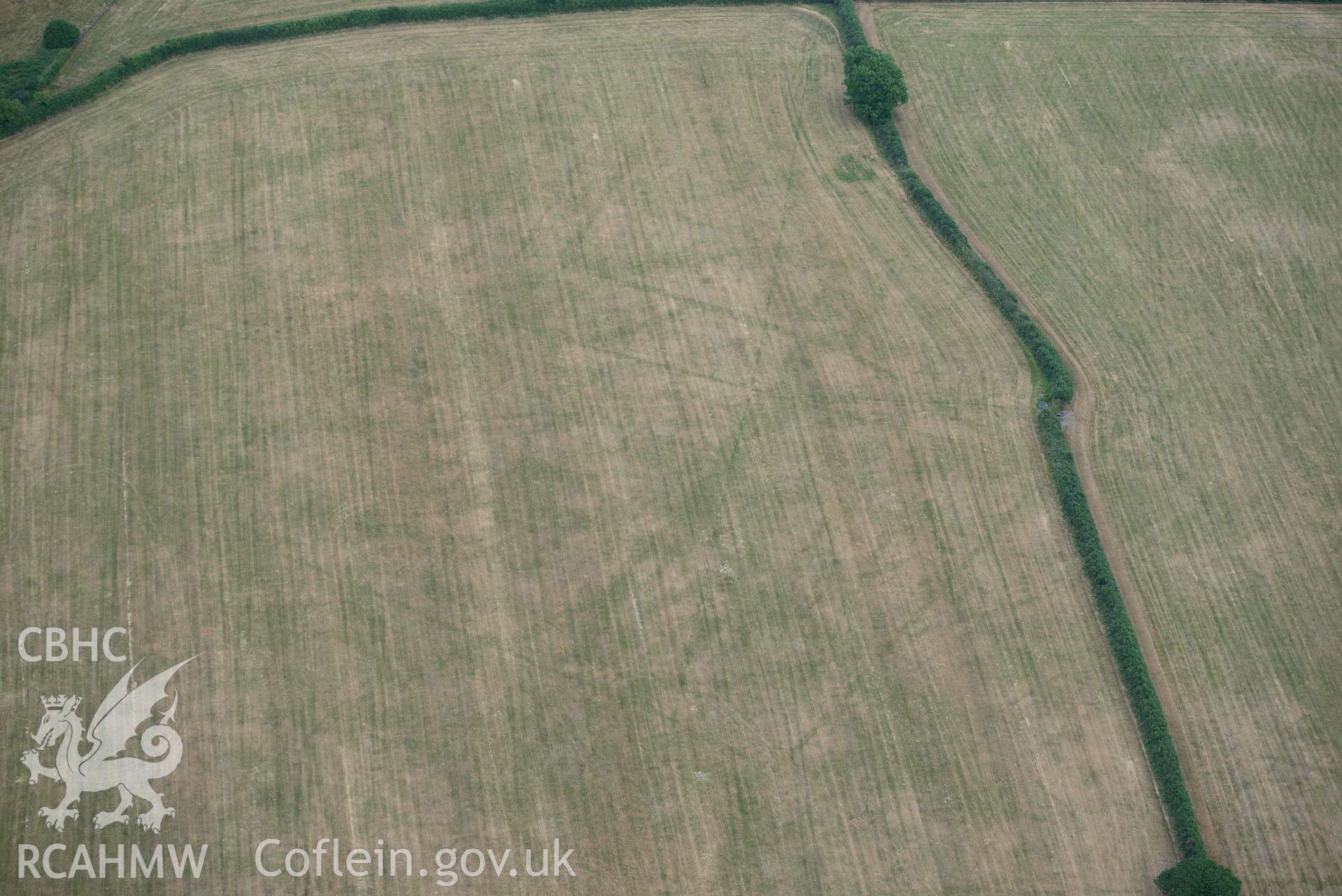 RCAHMW colour oblique aerial photograph of Llys y Fran Walton wood enclosures taken on 11 July 2018 by Toby Driver