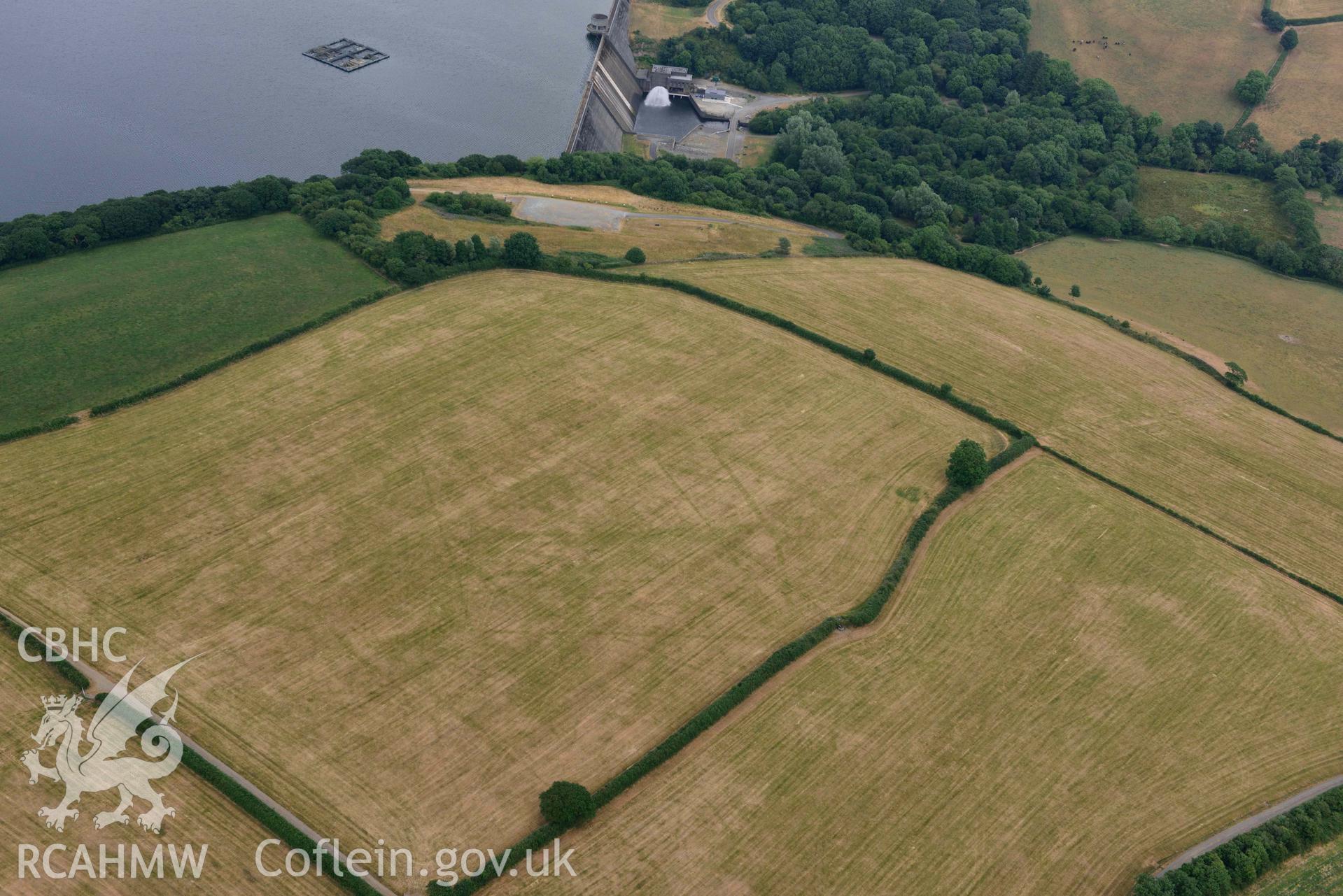 RCAHMW colour oblique aerial photograph of Llys y Fran Walton wood enclosures taken on 11 July 2018 by Toby Driver