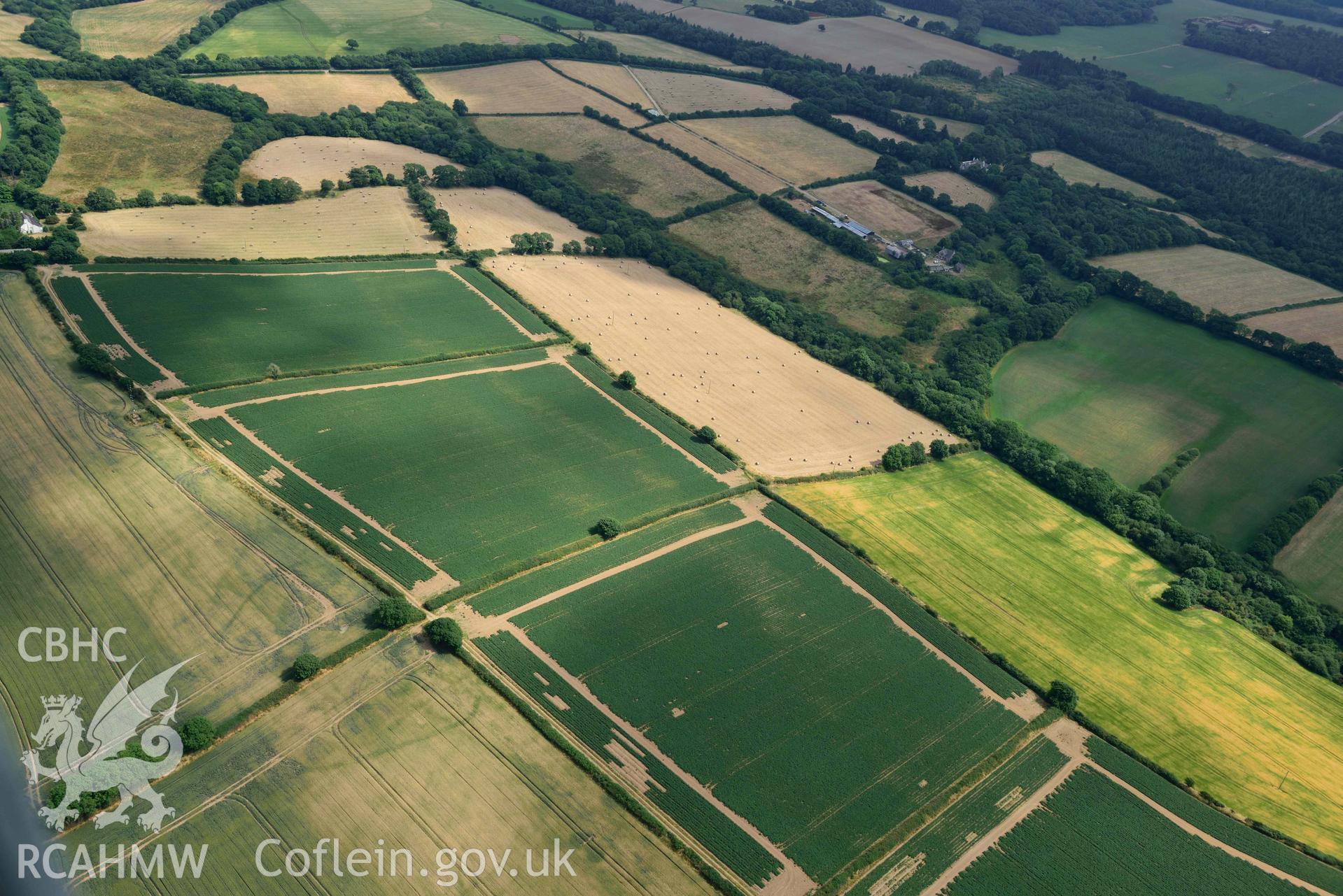 RCAHMW colour oblique aerial photograph of Arnolds Hill defended enclosure taken on 11 July 2018 by Toby Driver