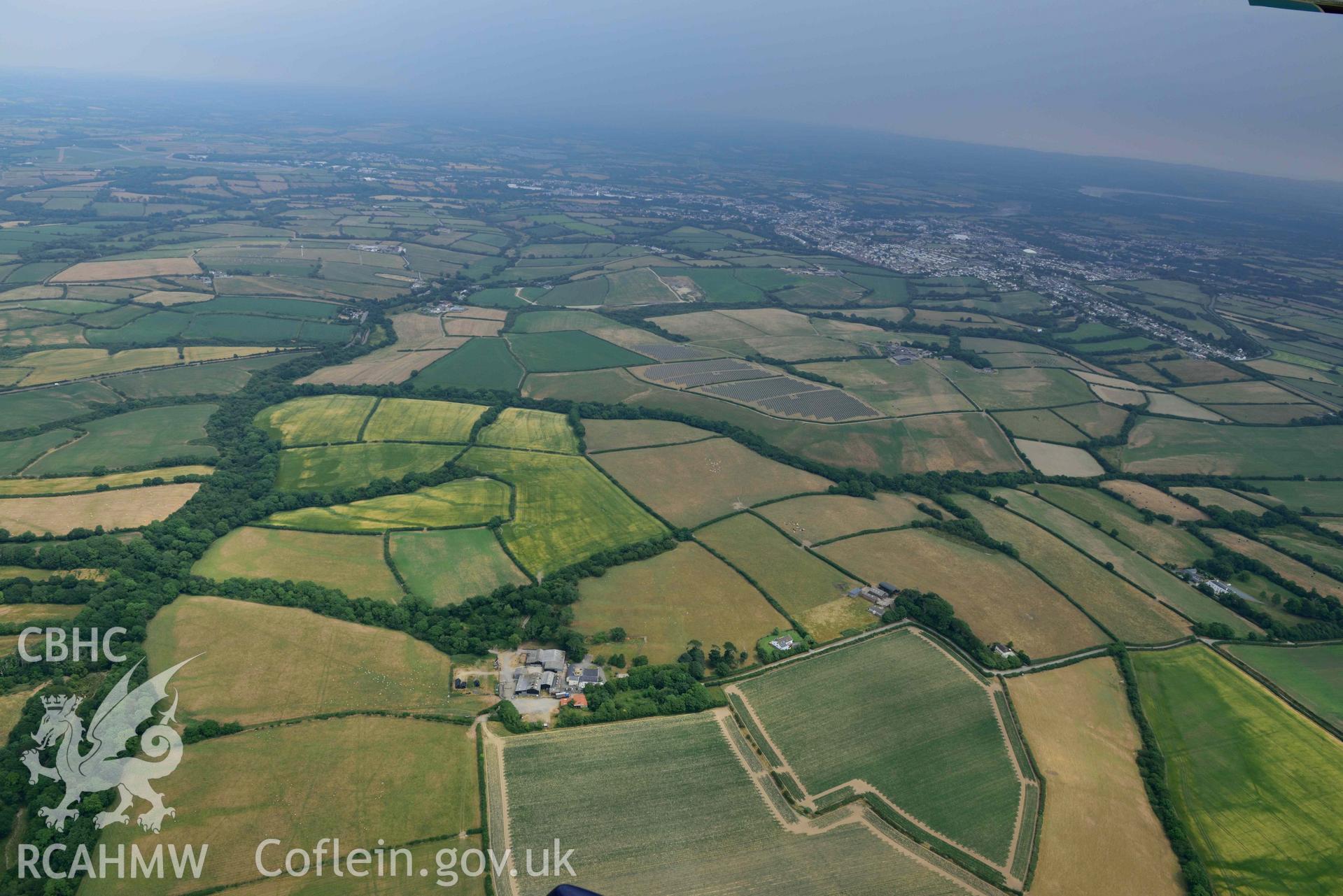 RCAHMW colour oblique aerial photograph of East Hook, LS view SE towards Hwest with parching taken on 11 July 2018 by Toby Driver