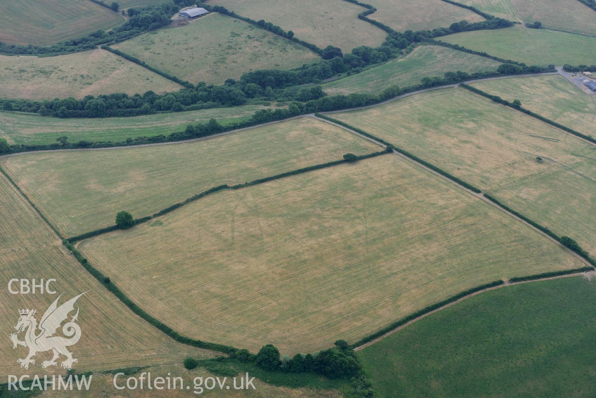 RCAHMW colour oblique aerial photograph of Llys y Fran Walton wood enclosures taken on 11 July 2018 by Toby Driver