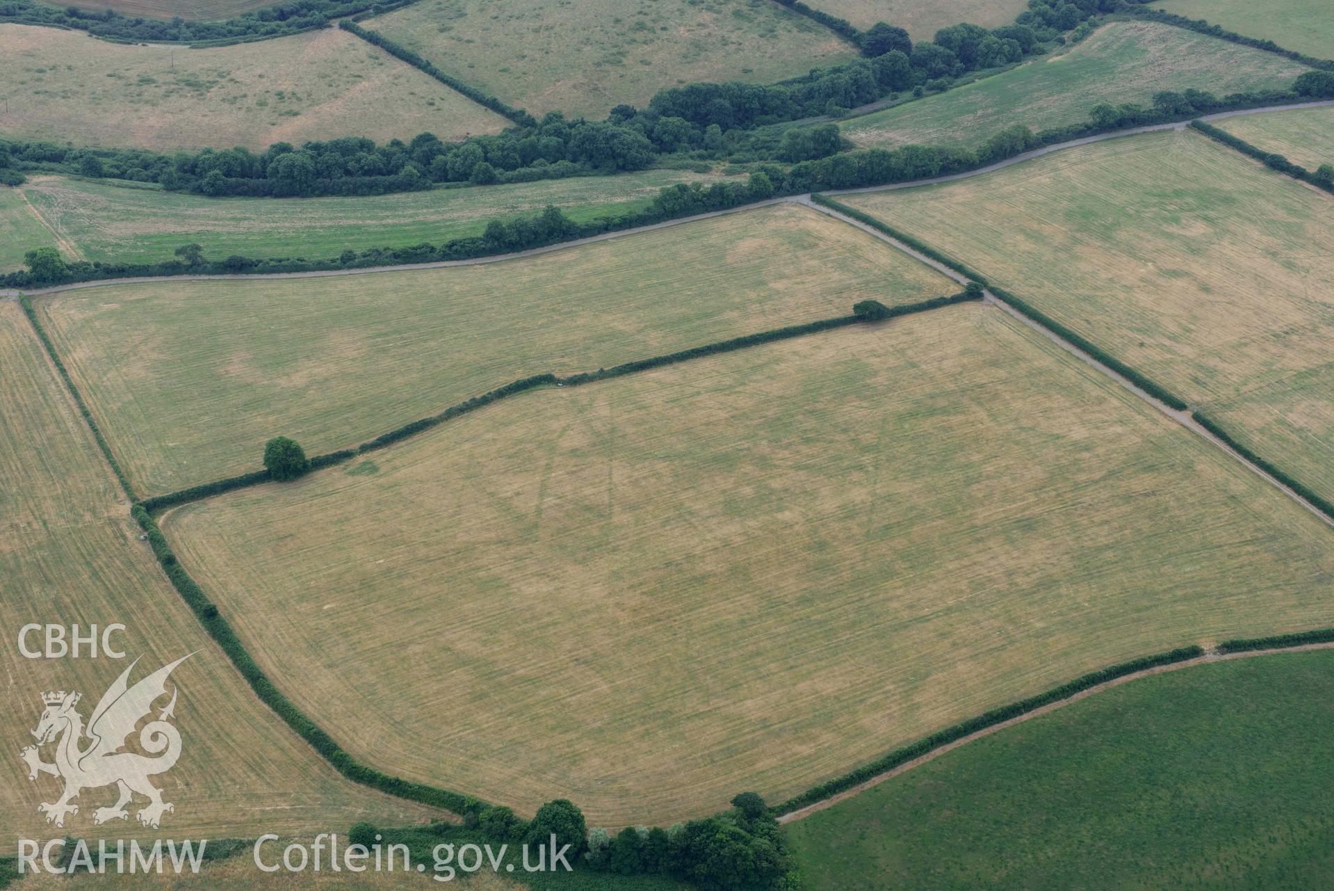 RCAHMW colour oblique aerial photograph of Llys y Fran Walton wood enclosures taken on 11 July 2018 by Toby Driver