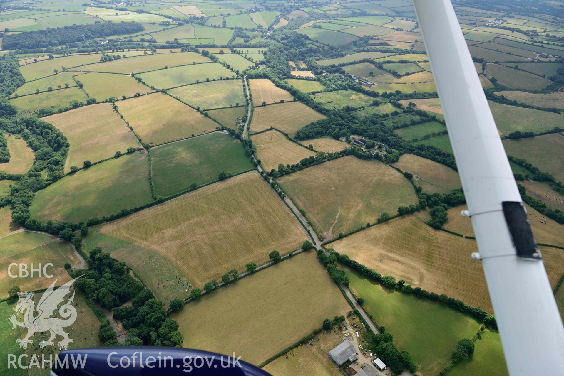 RCAHMW colour oblique aerial photograph of Southfield enclosure taken on 11 July 2018 by Toby Driver