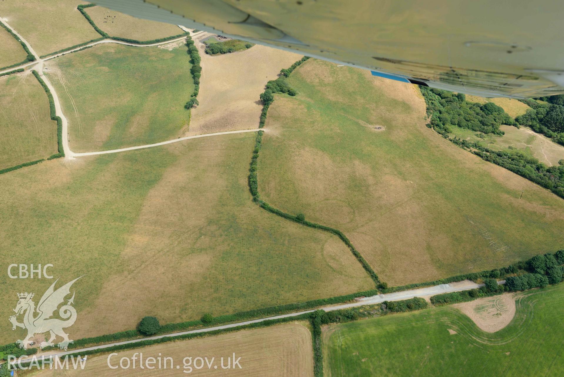 RCAHMW colour oblique aerial photograph of Post coch barrow pair taken on 11 July 2018 by Toby Driver