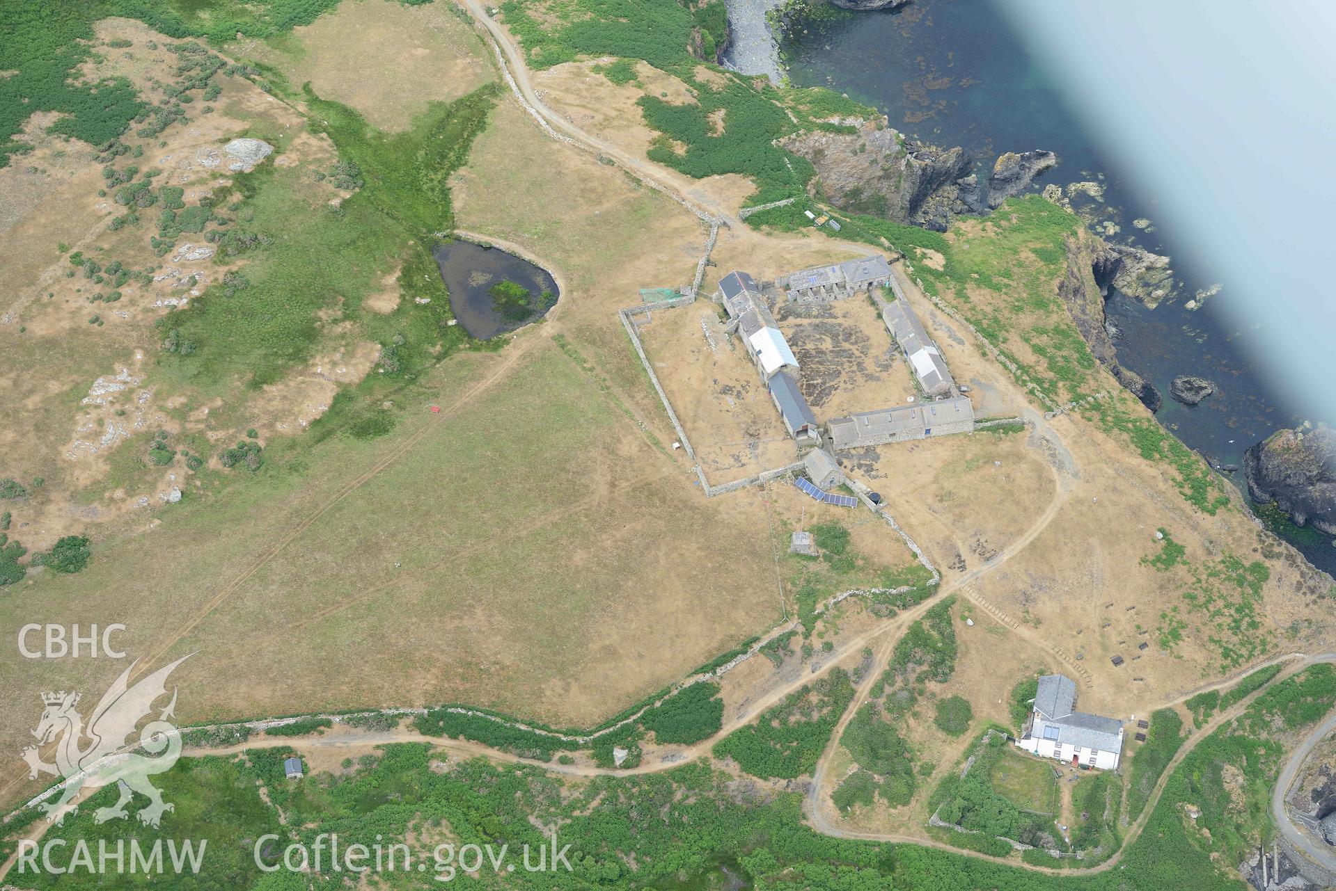 RCAHMW colour oblique aerial photograph of Ramsey Island, Ramsey Island Farm and St Tyfanog's chapel taken on 11 July 2018 by Toby Driver